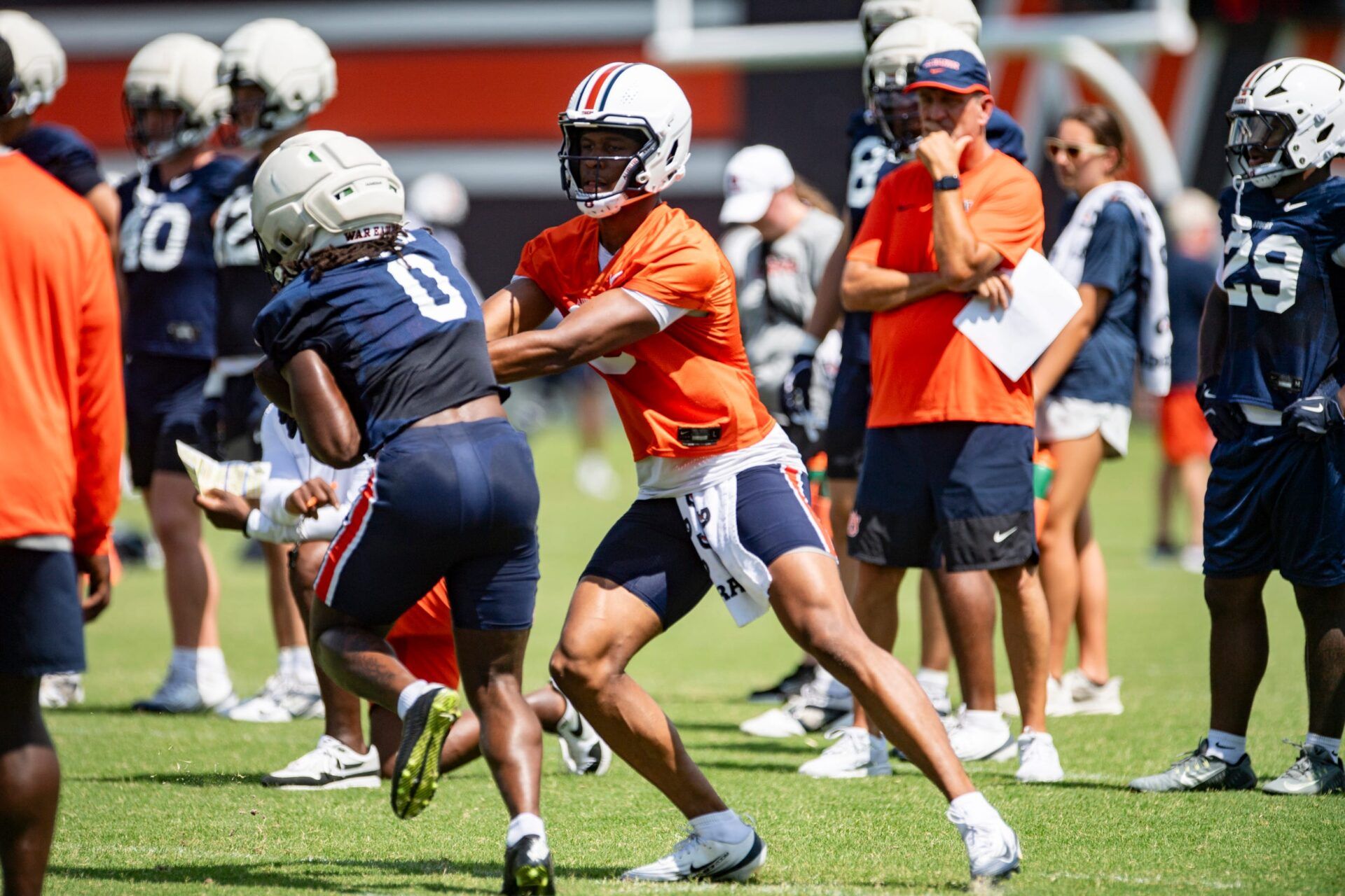 Auburn Tigers quarterback Deuce Knight (9) hands the ball off to running back Damari Alston (0) during practice at Woltosz Football Performance Center in Auburn, Ala. on Thursday, Aug. 14, 2025.