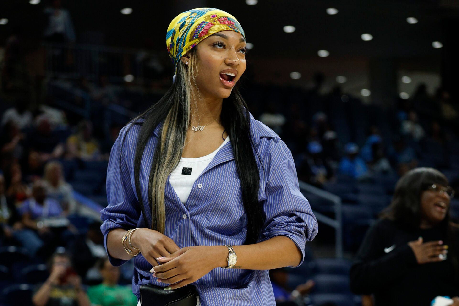 Injured Chicago Sky forward Angel Reese (5) stands on the court before a WNBA game against the Washington Mystics at Wintrust Arena.