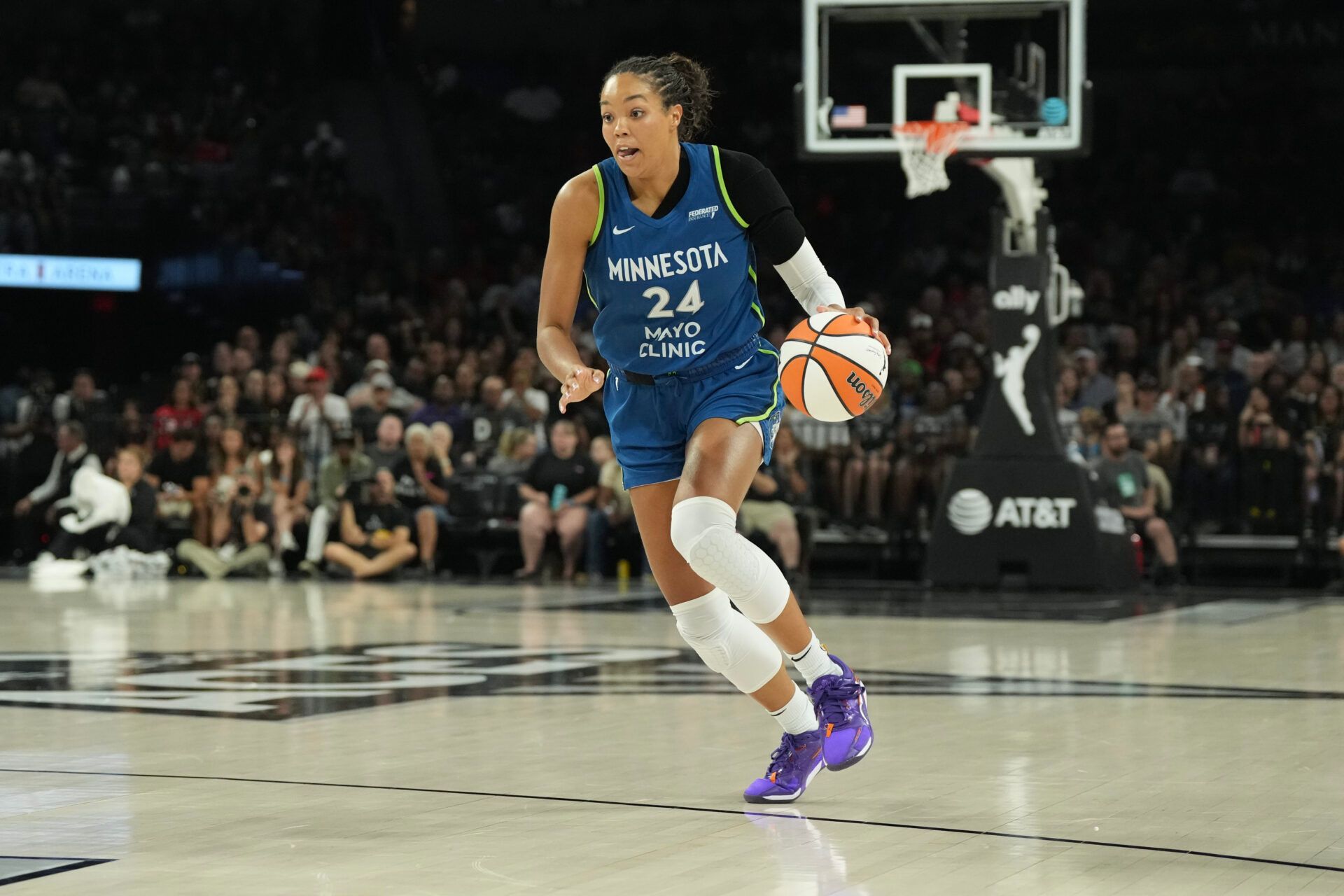 Minnesota Lynx forward Napheesa Collier (24) dribbles against the Las Vegas Aces during the first quarter at Michelob Ultra Arena.