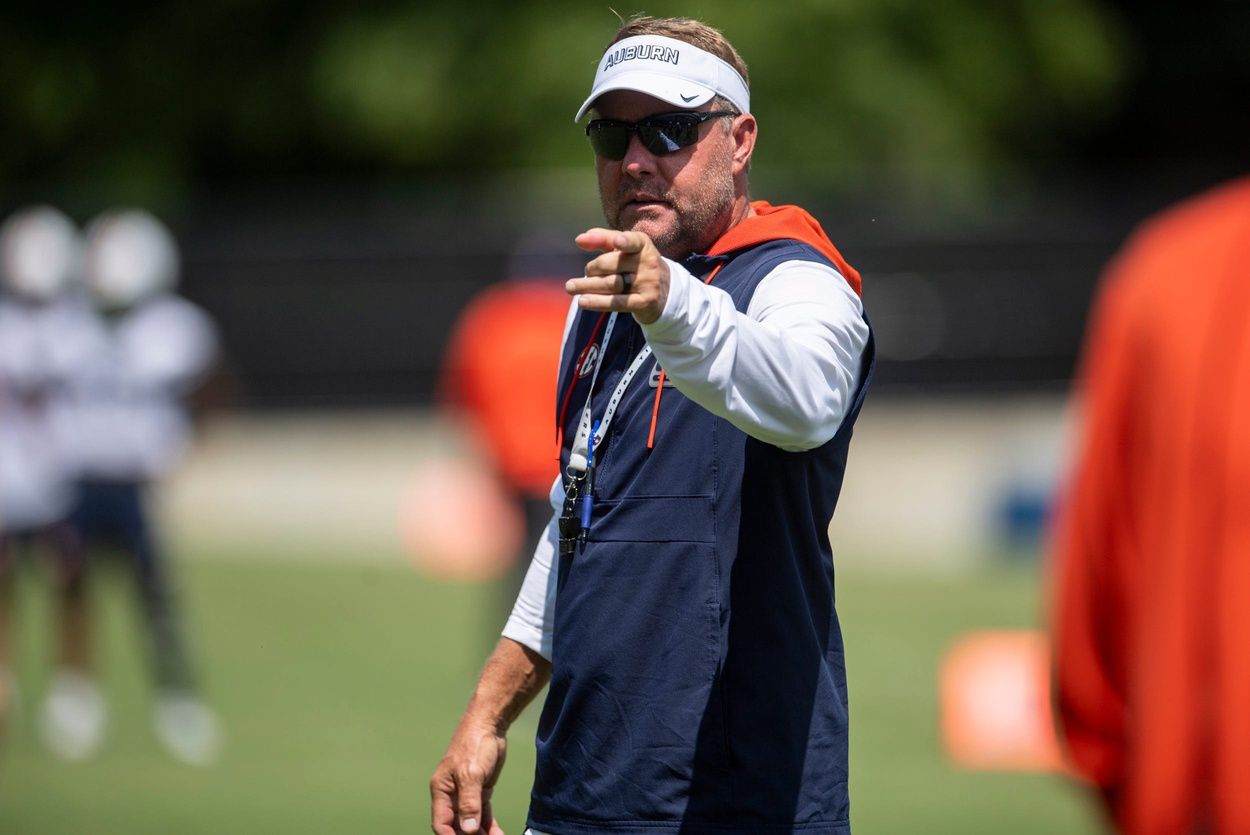 Auburn Tigers head coach Hugh Freeze talks with players during practice at Woltosz Football Performance Center in Auburn, Ala. on Thursday, Aug. 14, 2025.