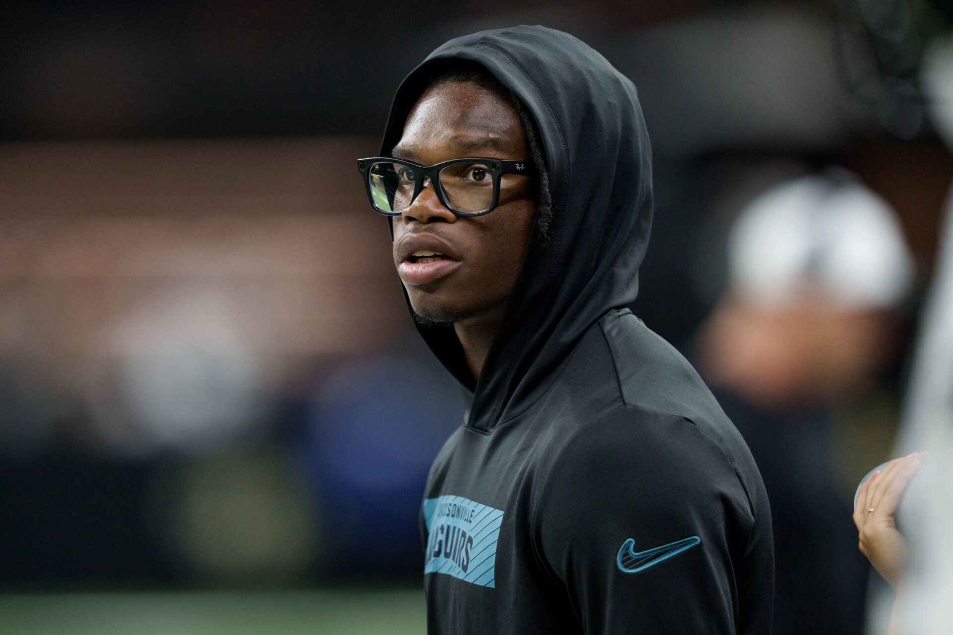 Jacksonville Jaguars wide receiver Travis Hunter (12) watches from the sidelines during a game against the New Orleans Saints at Caesars Superdome.