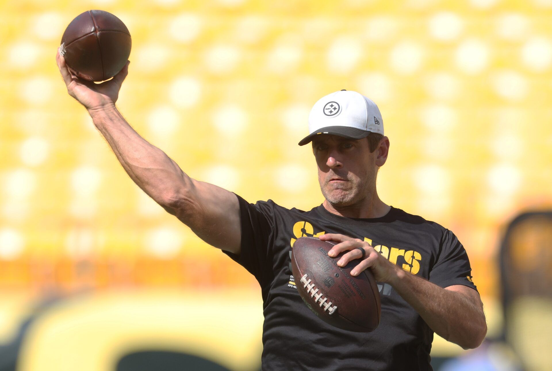 Pittsburgh Steelers quarterback Aaron Rodgers (8) warms up before the game against the Tampa Bay Buccaneers at Acrisure Stadium.