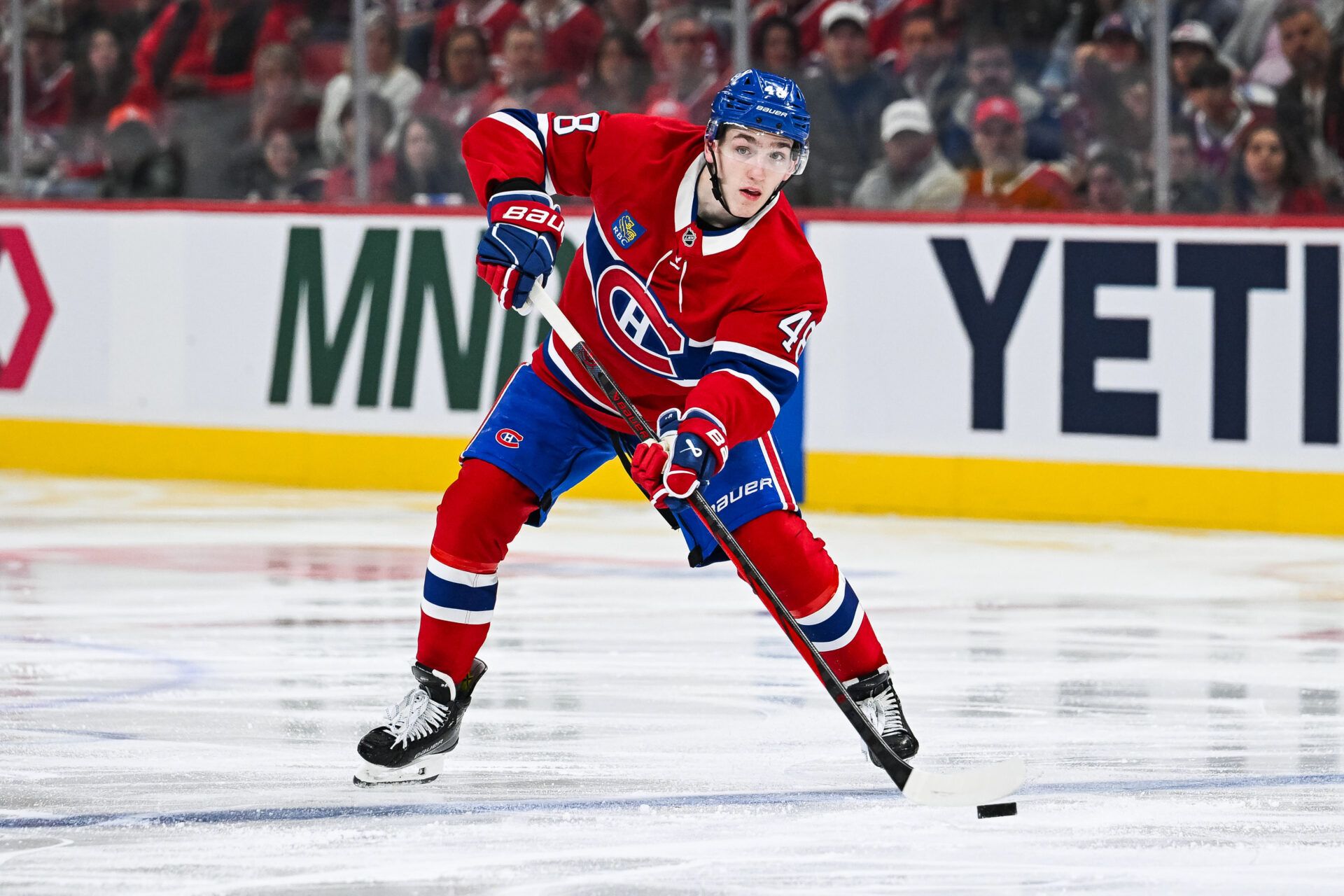 Montreal Canadiens defenseman Lane Hutson (48) considers his options with the puck against the Washington Capitals during the third period in game four of the first round of the 2025 Stanley Cup Playoffs at Bell Centre.