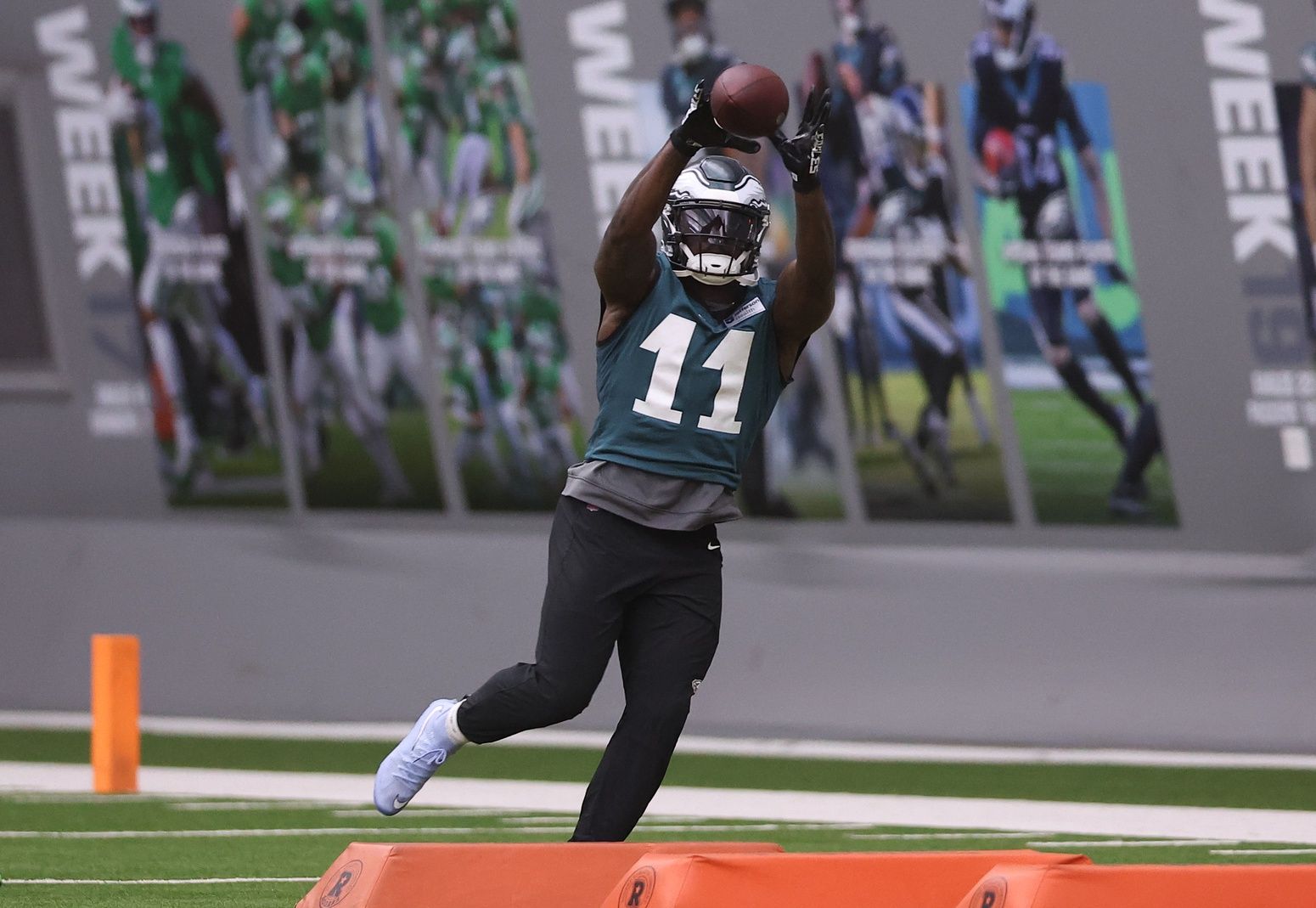Philadelphia Eagles wide receiver A.J. Brown (11) catches a ball during OTAs at NovaCare Complex.