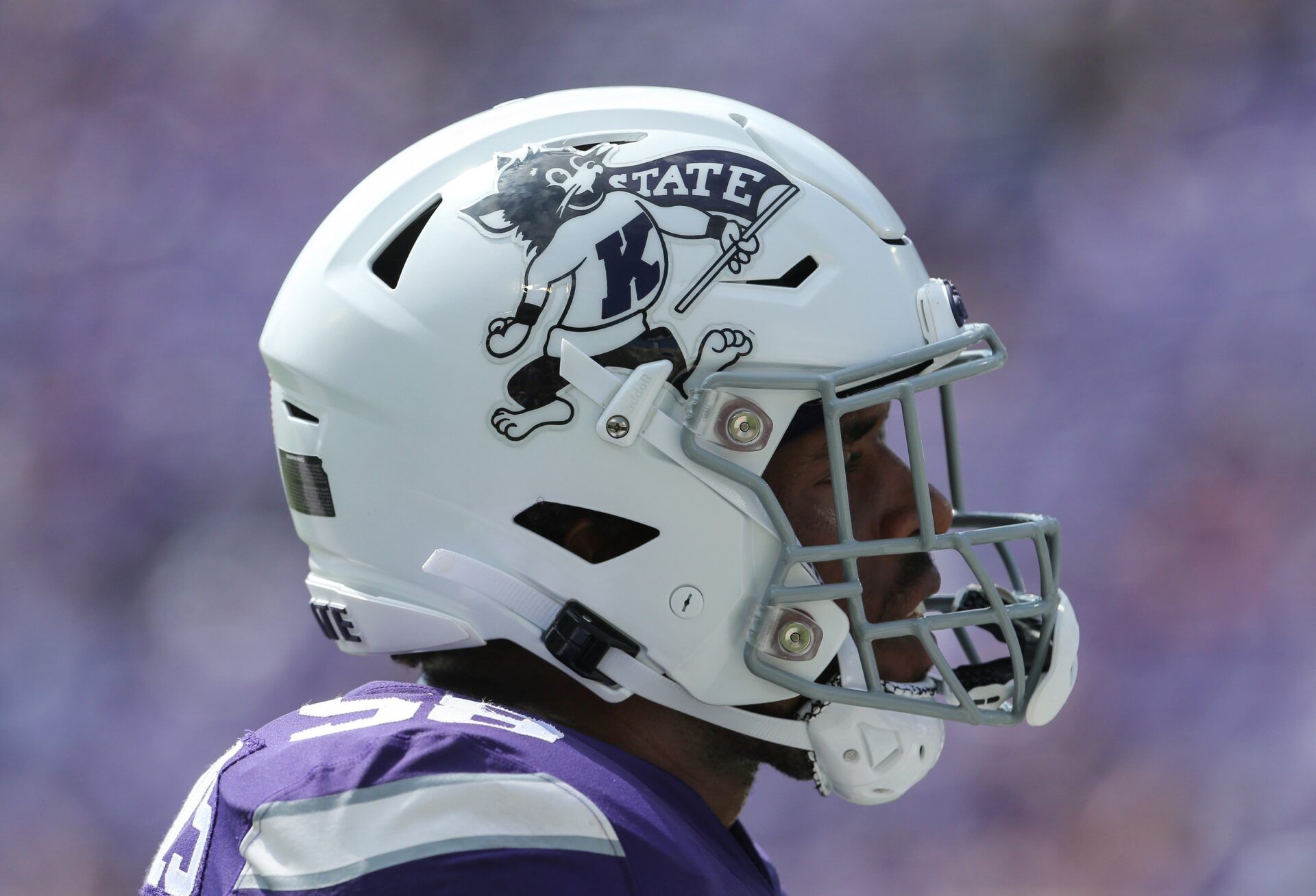 Kansas State Wildcats defensive end Cartez Crook-Jones (58) and the Wildcats wear throw-back logos on their helmets during the game against the Tulane Green Wave at Bill Snyder Family Football Stadium.