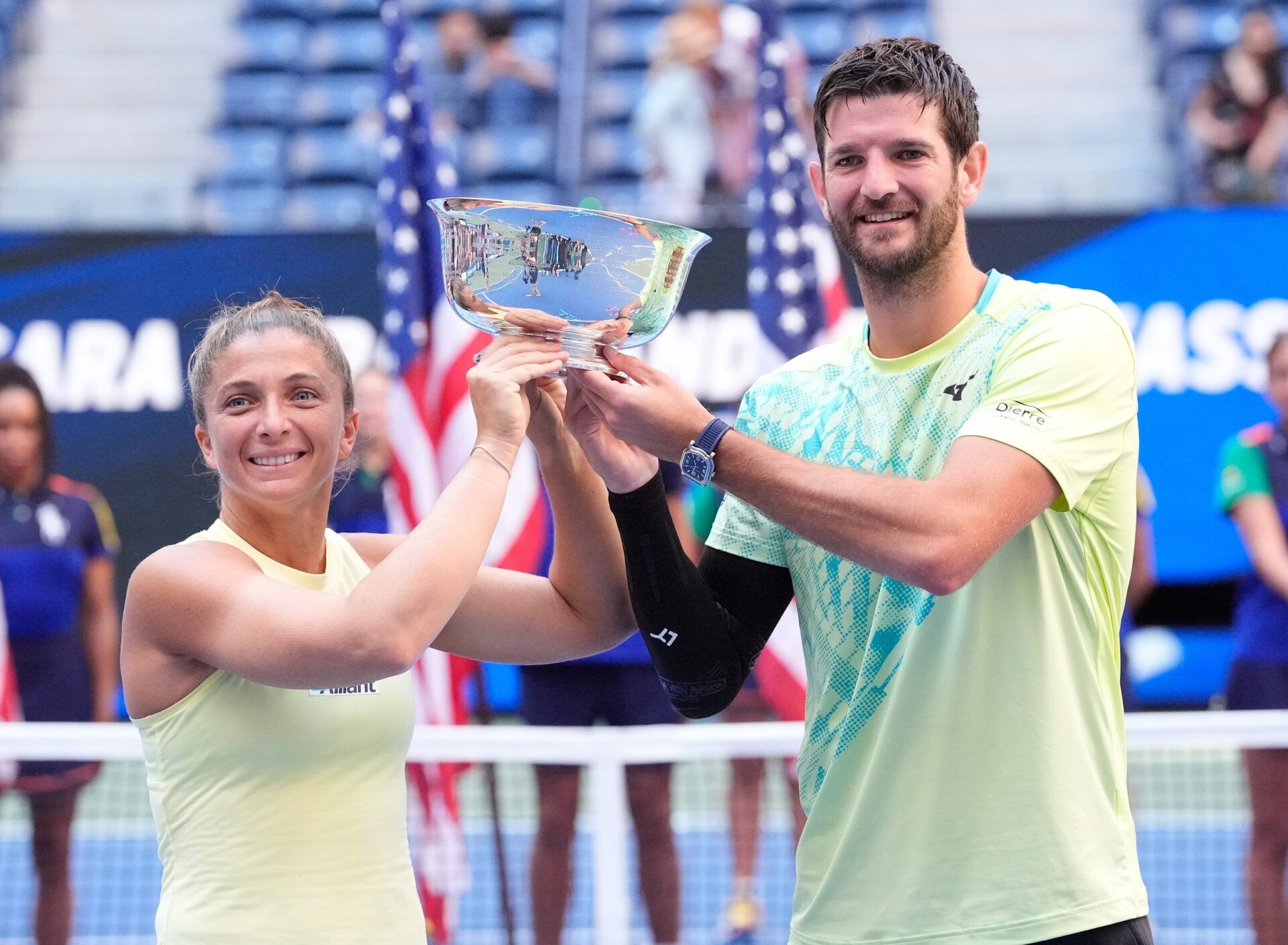 Sept 5 2024; Flushing, NY, USA;    Sara Errani and Andrea Vavassori (ITA) with the US Open trophy after beating Donald Young and Taylor Townsend (USA) in the Mixed Doubles Final on day eleven of the 2024 U.S. Open tennis tournament at USTA Billie Jean King National Tennis Center.
