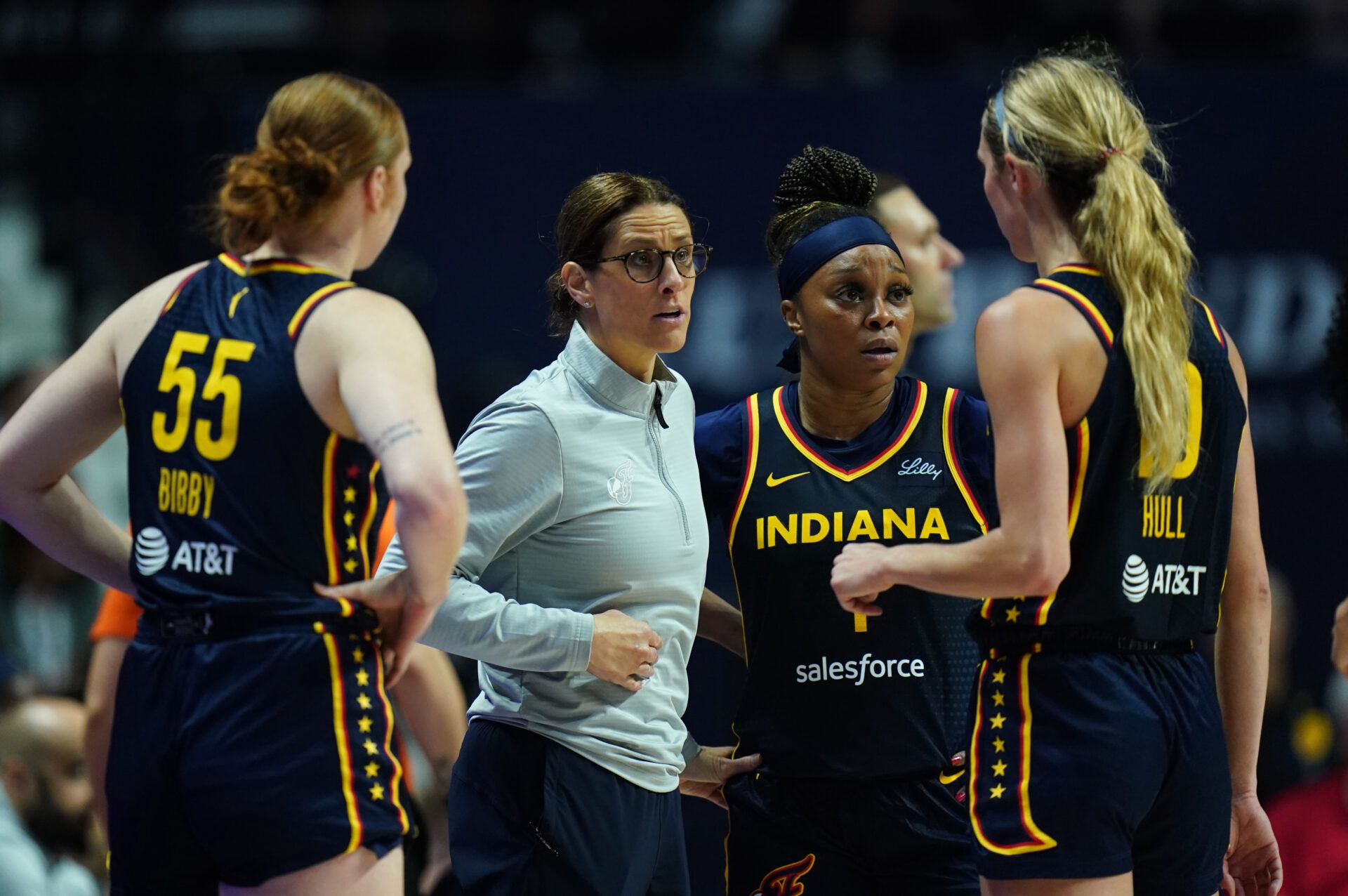 Indiana Fever head coach Stephanie White talks with her players from the sideline as they take on the Connecticut Sun at Mohegan Sun Arena.
