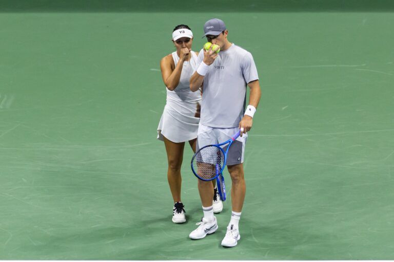 Jack Draper of Great Britain and Jessica Pegula of the United States in action in the semi-finals of the mixed doubles tournament at the US Open at Arthur Ashe Stadium.