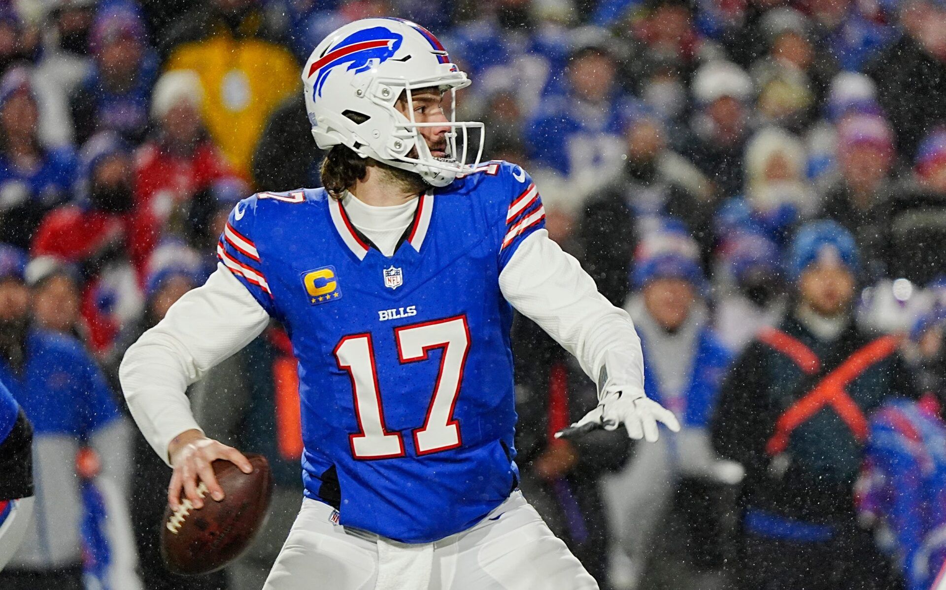 Buffalo Bills quarterback Josh Allen, ready to throw a pass, watches his receiver get into a position during first half action at the Buffalo Bills divisional game against the Baltimore Ravens at Highmark Stadium in Orchard Park on Jan. 19, 2025.