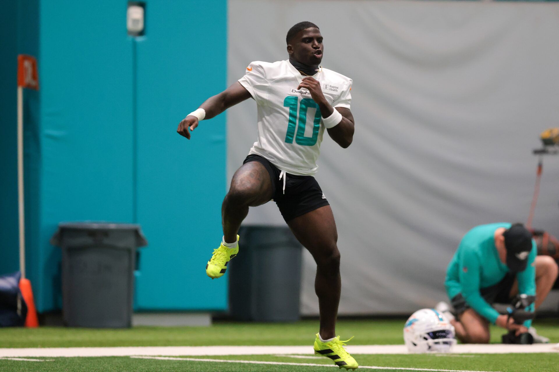 Miami Dolphins wide receiver Tyreek Hill (10) works out during training camp at Baptist Health Training Complex.