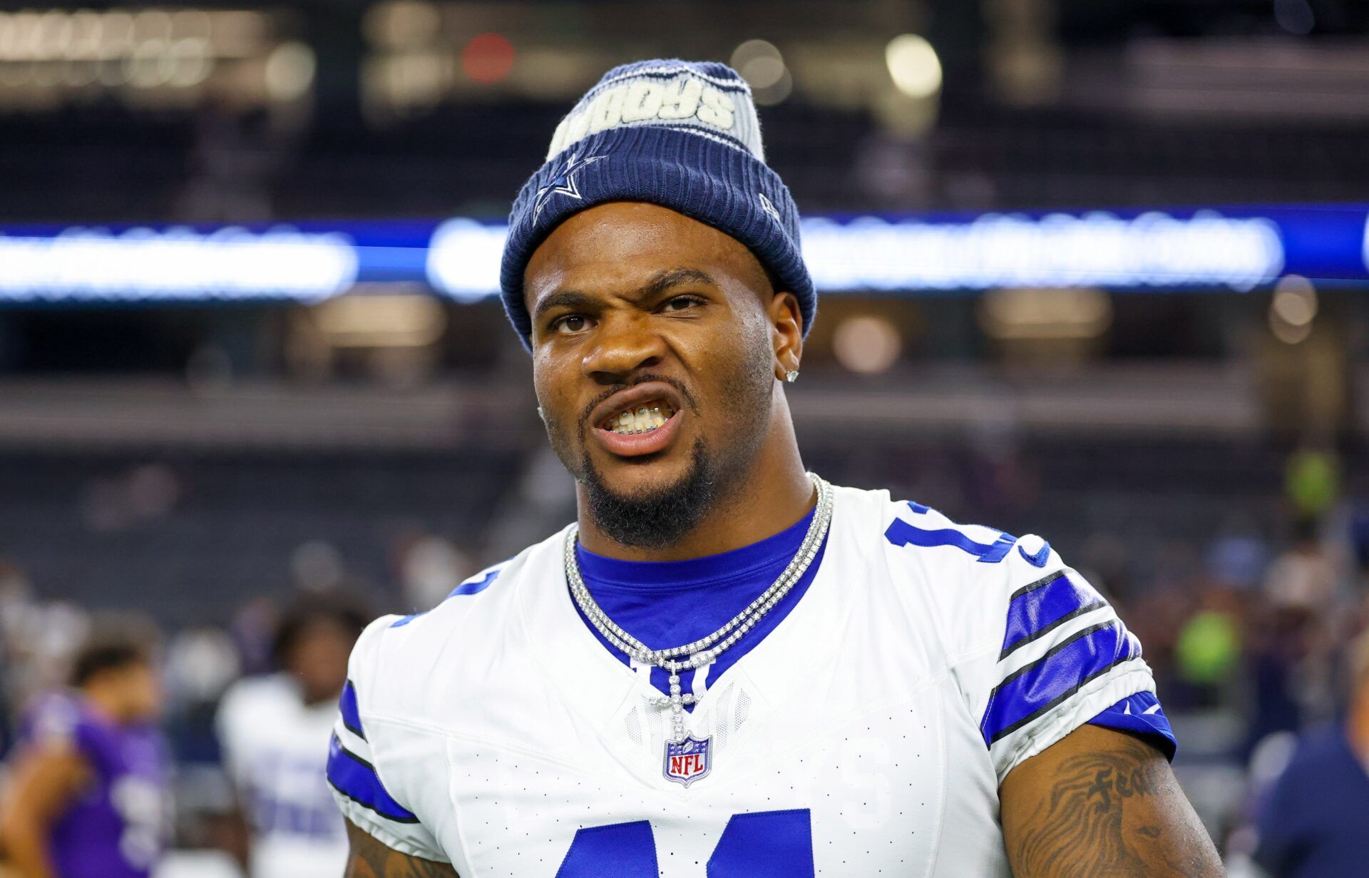 Dallas Cowboys defensive end Micah Parsons (11) reacts after the game against the Baltimore Ravens at AT&T Stadium.