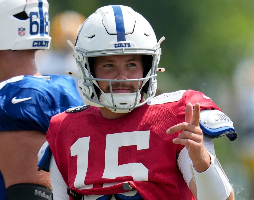 Indianapolis Colts quarterback Riley Leonard (15) motions Thursday, Aug. 14, 2025, at a joint practice with the Green Bay Packers during training camp at Grand Park in Westfield.