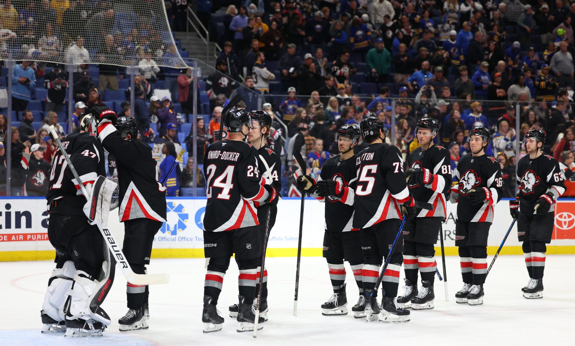 The Buffalo Sabres celebrate a win over the Philadelphia Flyers at KeyBank Center.