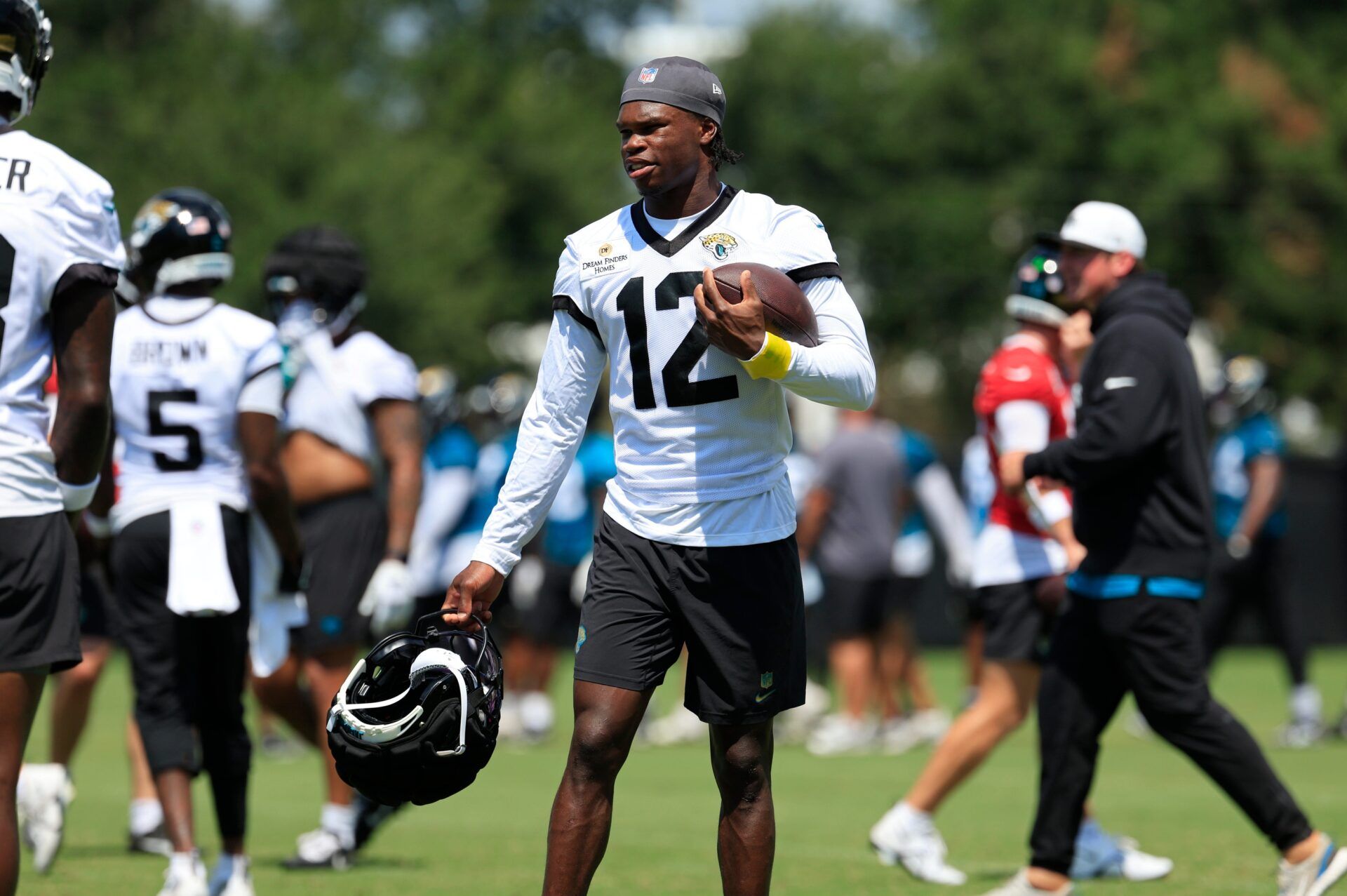 Jacksonville Jaguars wide receiver Travis Hunter (12) looks on during an NFL training camp session at the Miller Electric Center, Friday Aug. 15, 2025 in Jacksonville, Fla. [Corey Perrine/Florida Times-Union]