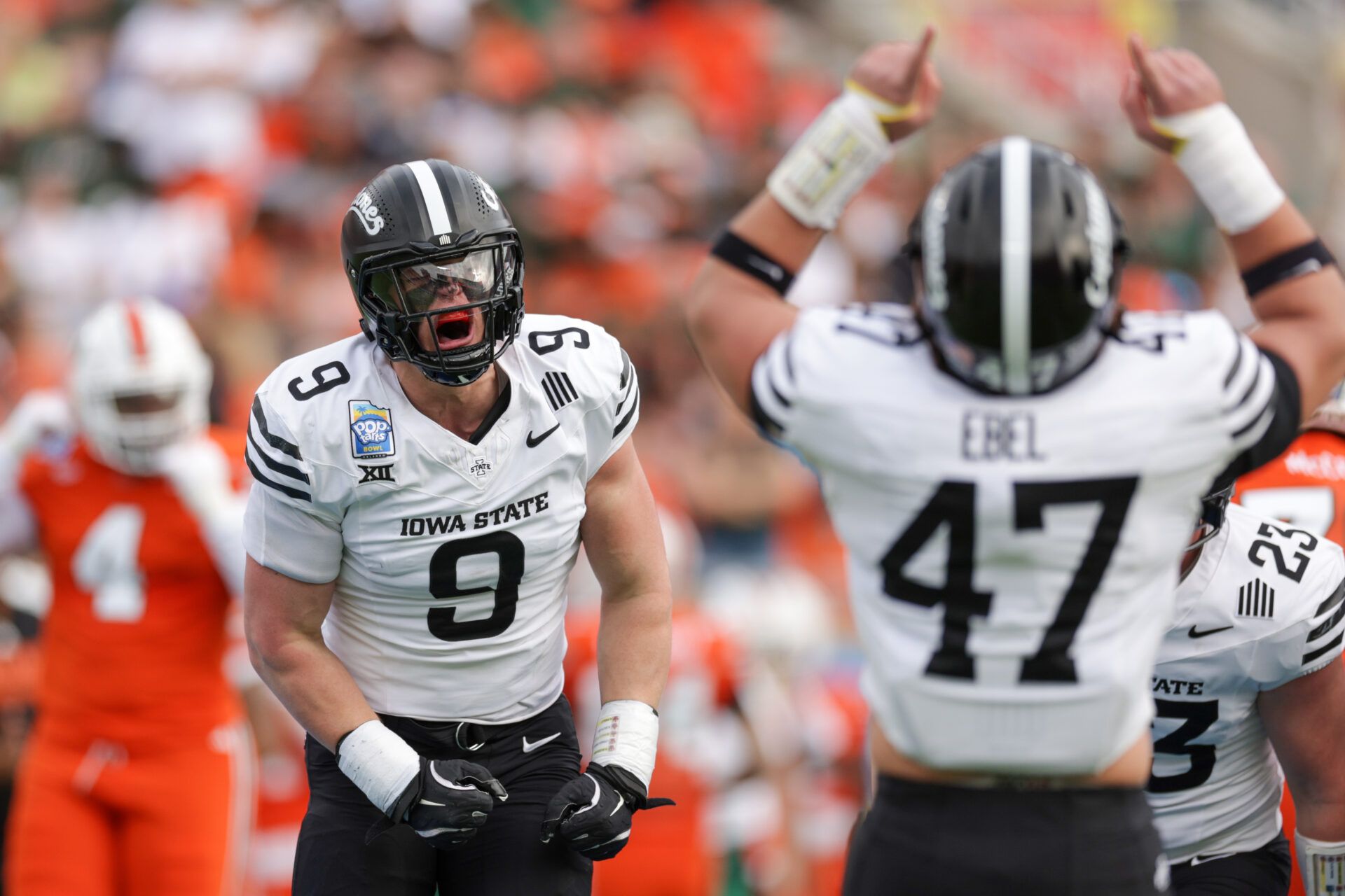 Iowa State Cyclones linebacker Cael Brezina (9) celebrates after recovering a fumble against the Miami Hurricanes in the first quarter during the Pop Tarts bowl at Camping World Stadium.