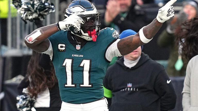 PHILADELPHIA, PENNSYLVANIA - JANUARY 26: A.J. Brown #11 of the Philadelphia Eagles reacts after making a catch for a first down against the Washington Commanders during the second quarter in the NFC Championship Game at Lincoln Financial Field on January 26, 2025 in Philadelphia, Pennsylvania.  (Photo by Mitchell Leff/Getty Images)