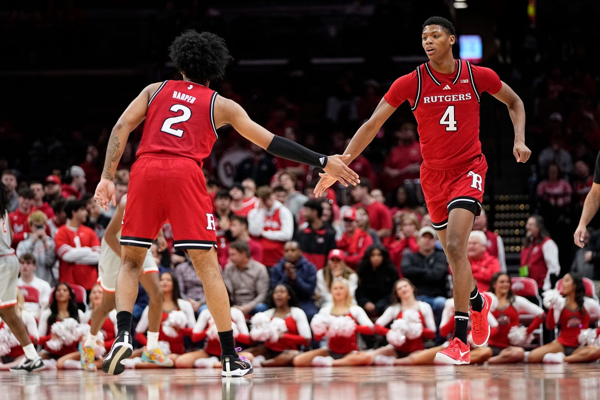 Rutgers Scarlet Knights guard Dylan Harper (2) high fives guard Ace Bailey (4) during the second half of the NCAA men's basketball game against the Ohio State Buckeyes at Value City Arena in Columbus on Saturday, Dec. 7, 2024. Ohio State won 80-66.