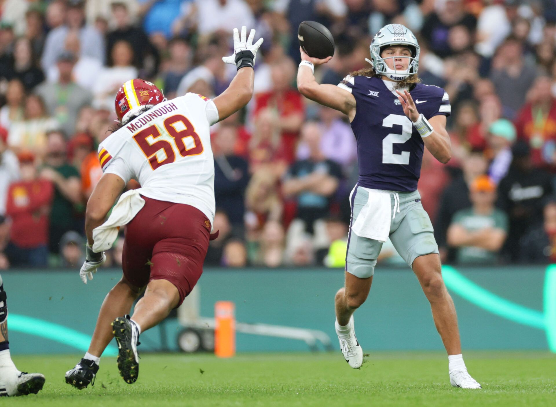 Kansas State quarterback Avery Johnson throws a pass during the Aer Lingus Classic between Iowa State and Kansas State at Aviva Stadium.