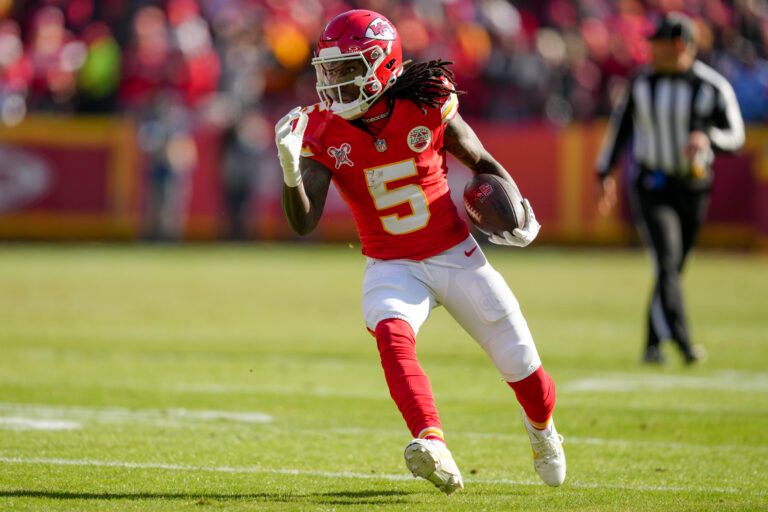 KANSAS CITY, MISSOURI - DECEMBER 21: Hollywood Brown #5 of the Kansas City Chiefs runs after a catch in the first quarter of a game against the Houston Texans at GEHA Field at Arrowhead Stadium on December 21, 2024 in Kansas City, Missouri. (Photo by Jason Hanna/Getty Images)
