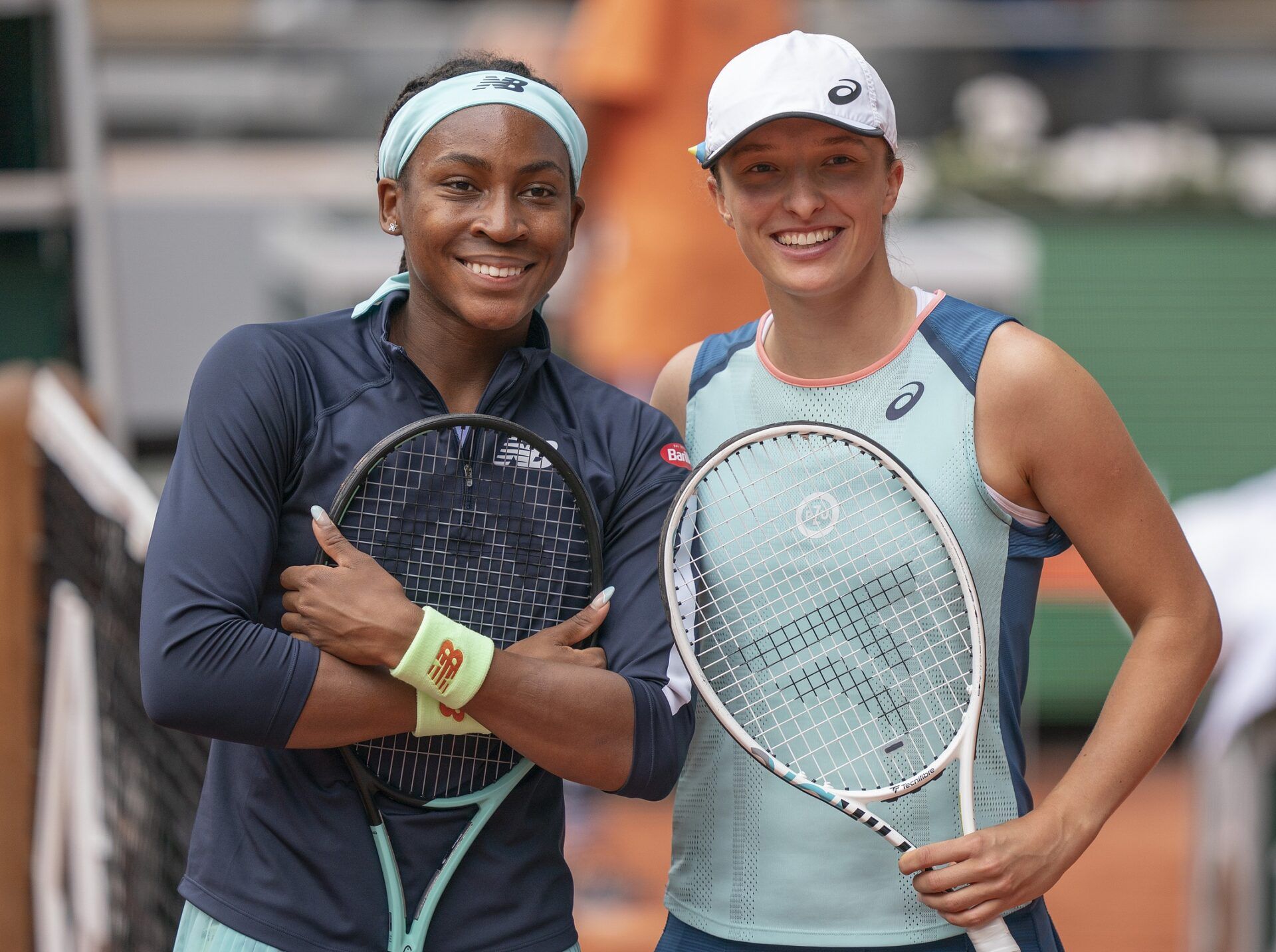 Iga Swiatek (POL) and Coco Gauff (USA) at the net before their womenÕs final match on day 14 of the French Open at Stade Roland-Garros.