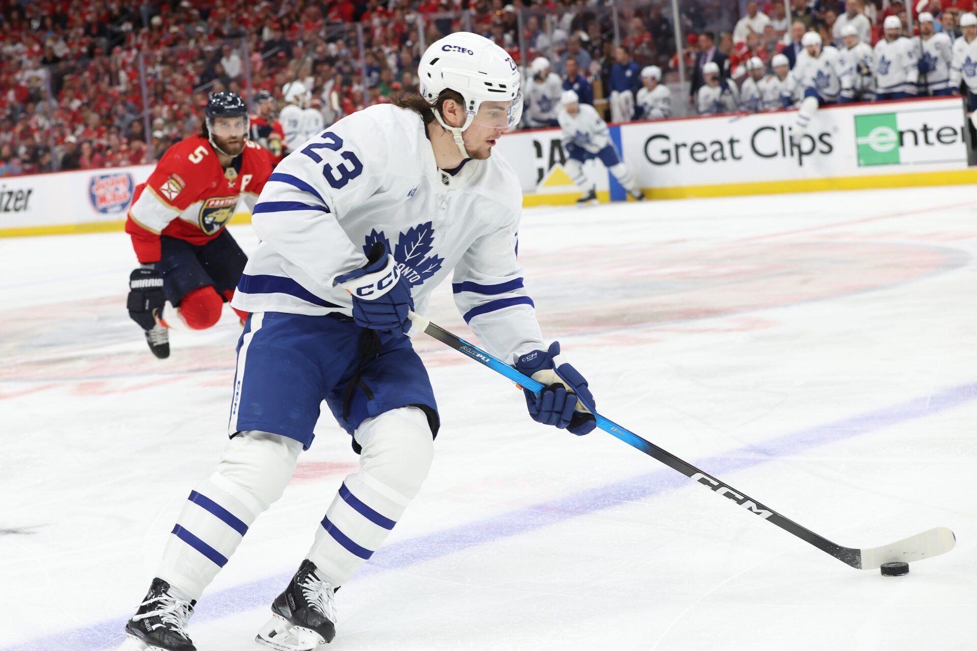 Toronto Maple Leafs left wing Matthew Knies (23) skates with the puck against the Florida Panthers during the first period in game four of the second round of the 2025 Stanley Cup Playoffs at Amerant Bank Arena.