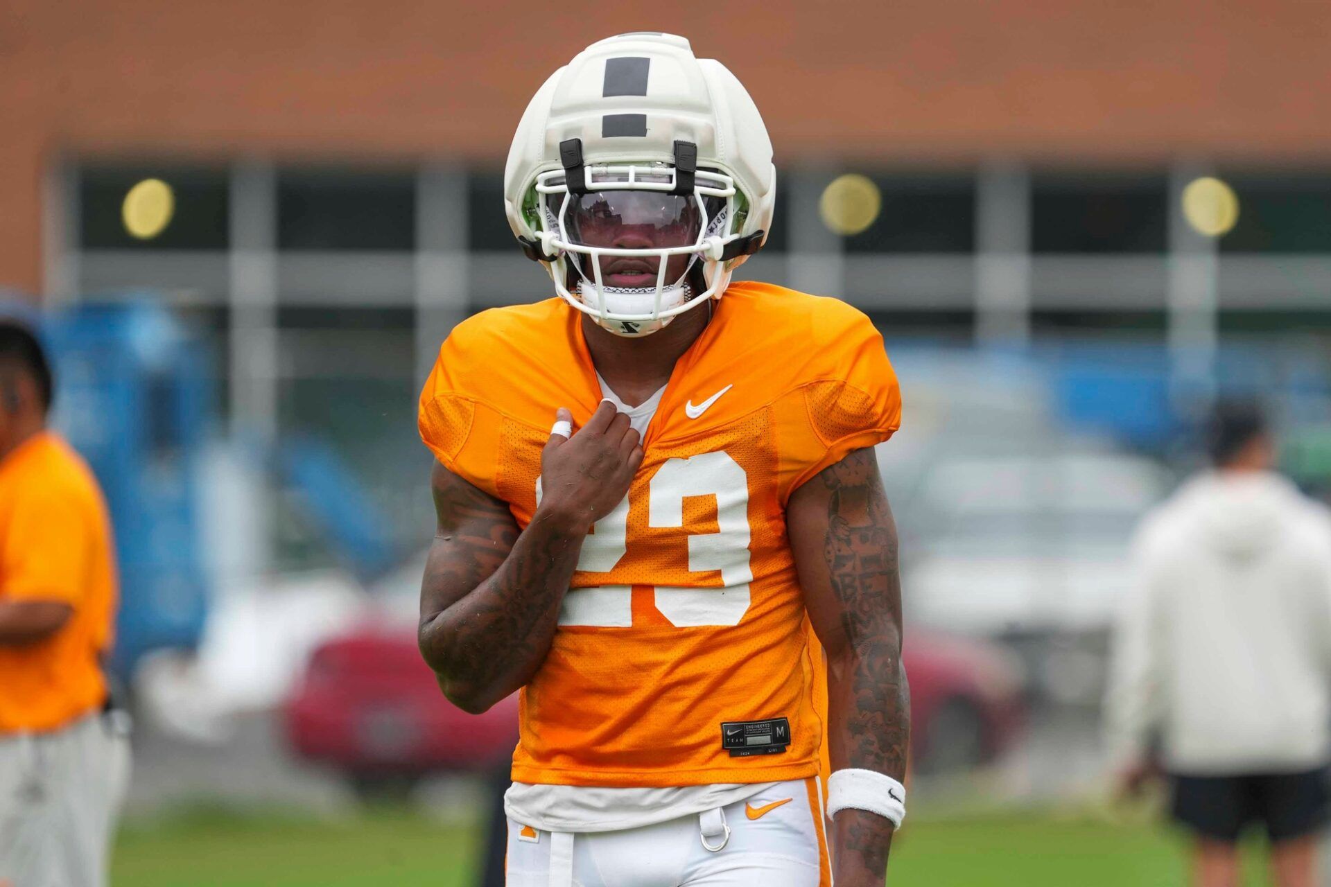 Tennessee defensive back Boo Carter (23) pulls on his jersey during Tennessee football preseason practice, in Knoxville, Tennessee, Aug. 6, 2025.