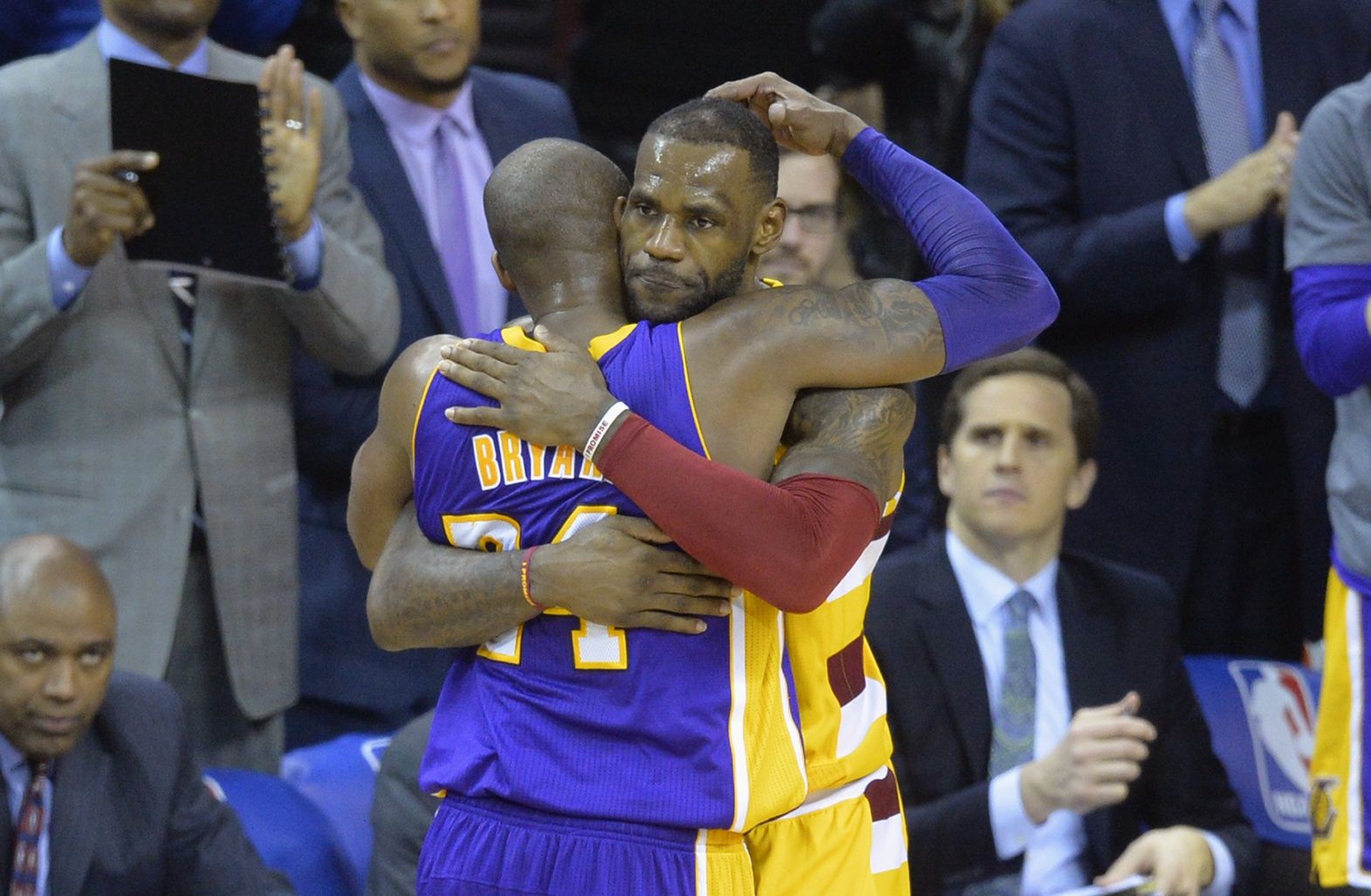 Cleveland Cavaliers forward LeBron James (23) hugs Los Angeles Lakers forward Kobe Bryant (24) near the end of the Cavaliers' 120-111 win at Quicken Loans Arena.