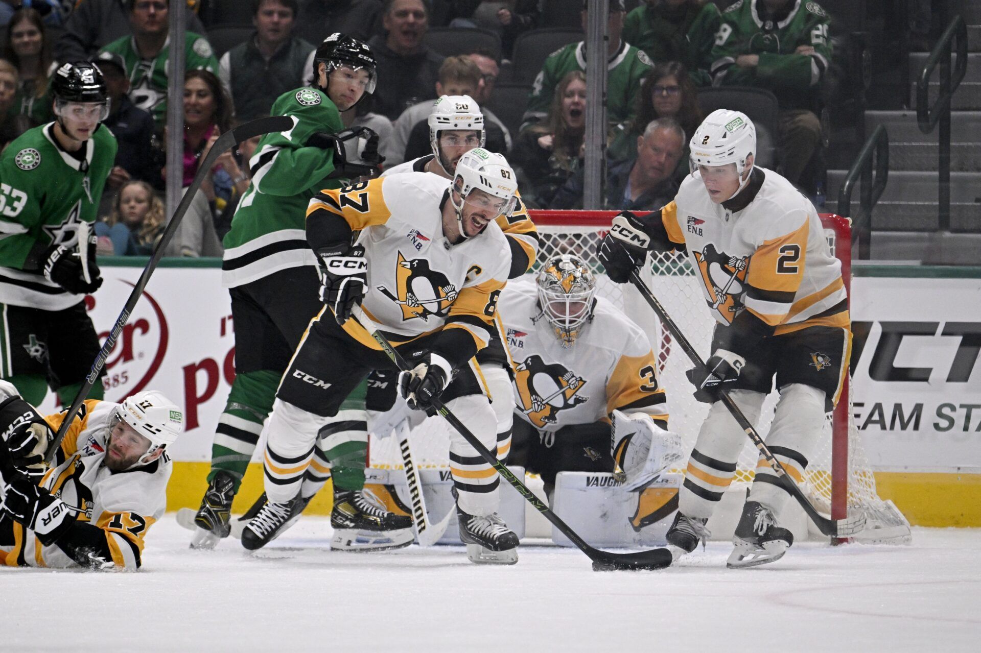Pittsburgh Penguins center Sidney Crosby (87) scores a goal on an empty net for a hat trick against the Dallas Stars during the third period at the American Airlines Center.