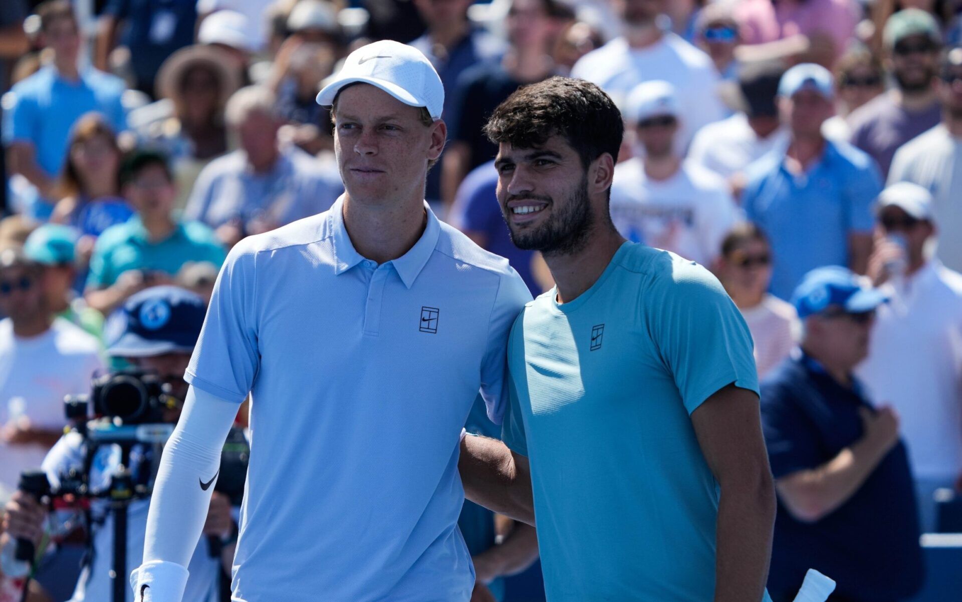 Jannik Sinner (left) and Carlos Alcaraz pose for a phot before their Men's Singles Finals match at the Cincinnati Open in Mason, Ohio on Monday August 18, 2025. Sinner retired due to illness after losing five games to Alcaraz.