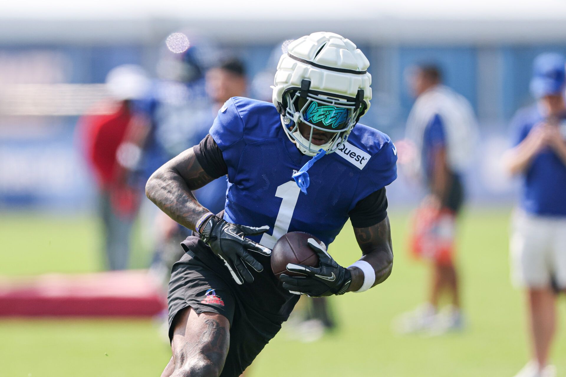 New York Giants wide receiver Malik Nabers (1) makes a catch during training camp at Quest Diagnostics Training Center.