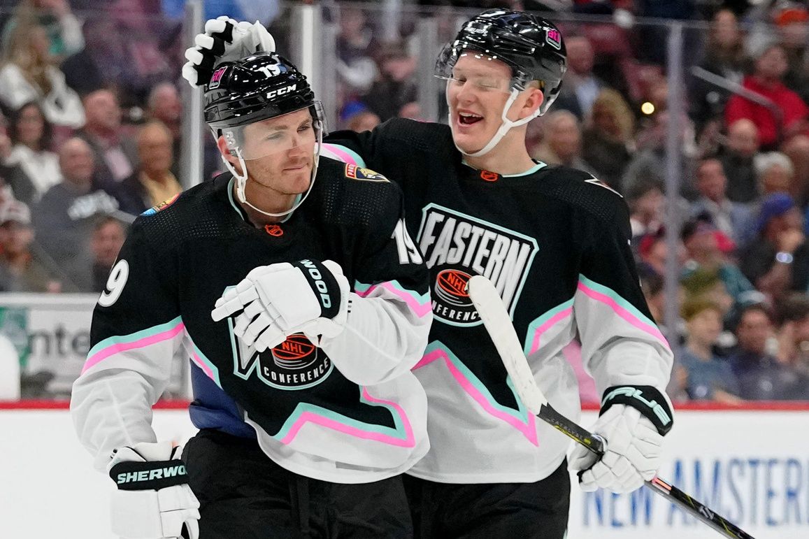 Atlantic Division forward Brady Tkachuk (71) of the Ottawa Senators congratulates Atlantic Division forward Matthew Tkachuk (19) of the Florida Panthers during the second period of a semifinal game during the 2023 NHL All-Star Game at FLA Live Arena.