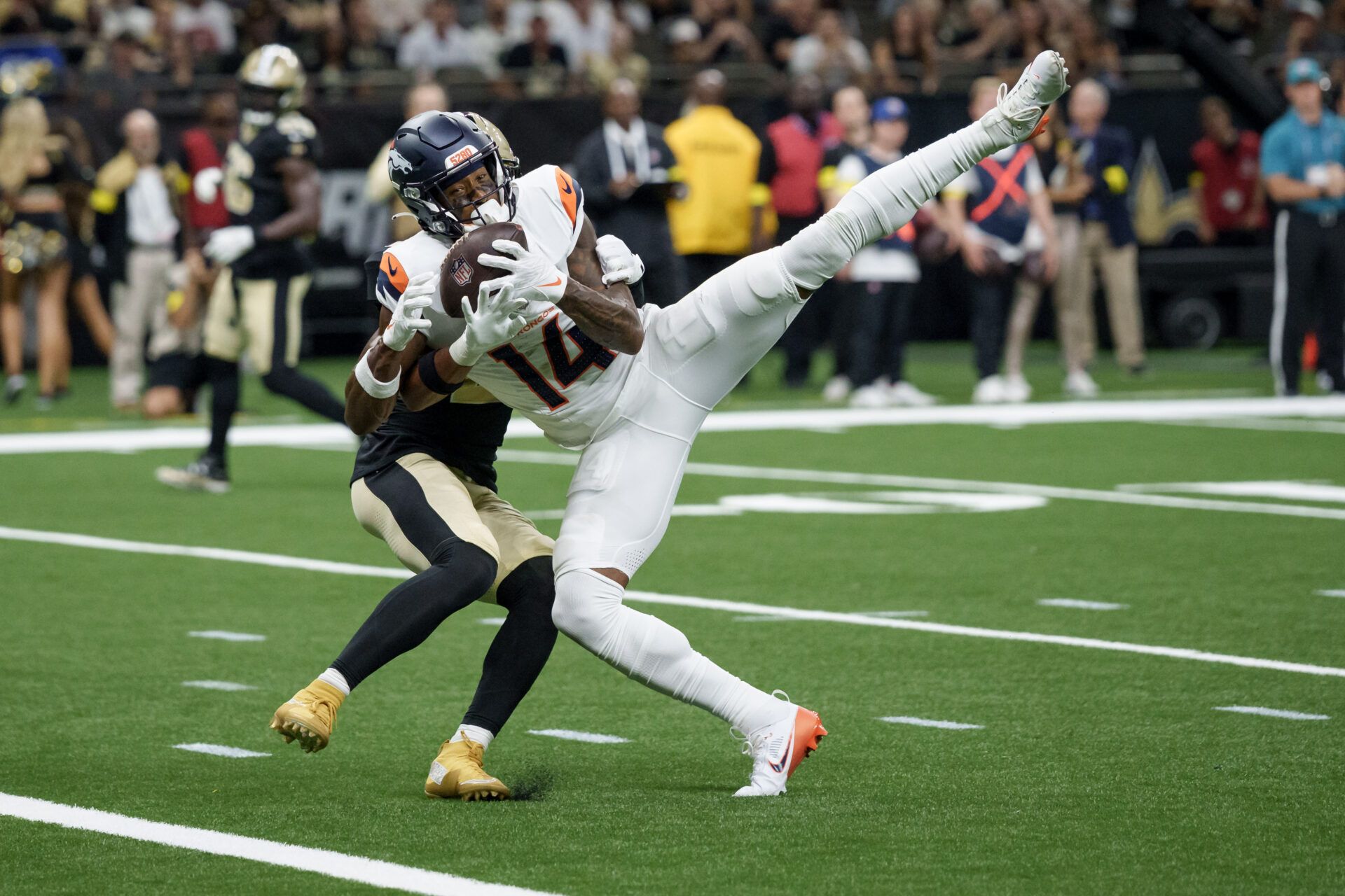 Denver Broncos wide receiver Courtland Sutton (14) makes a touchdown reception against New Orleans Saints safety Julian Blackmon (28) during the first half at Caesars Superdome.