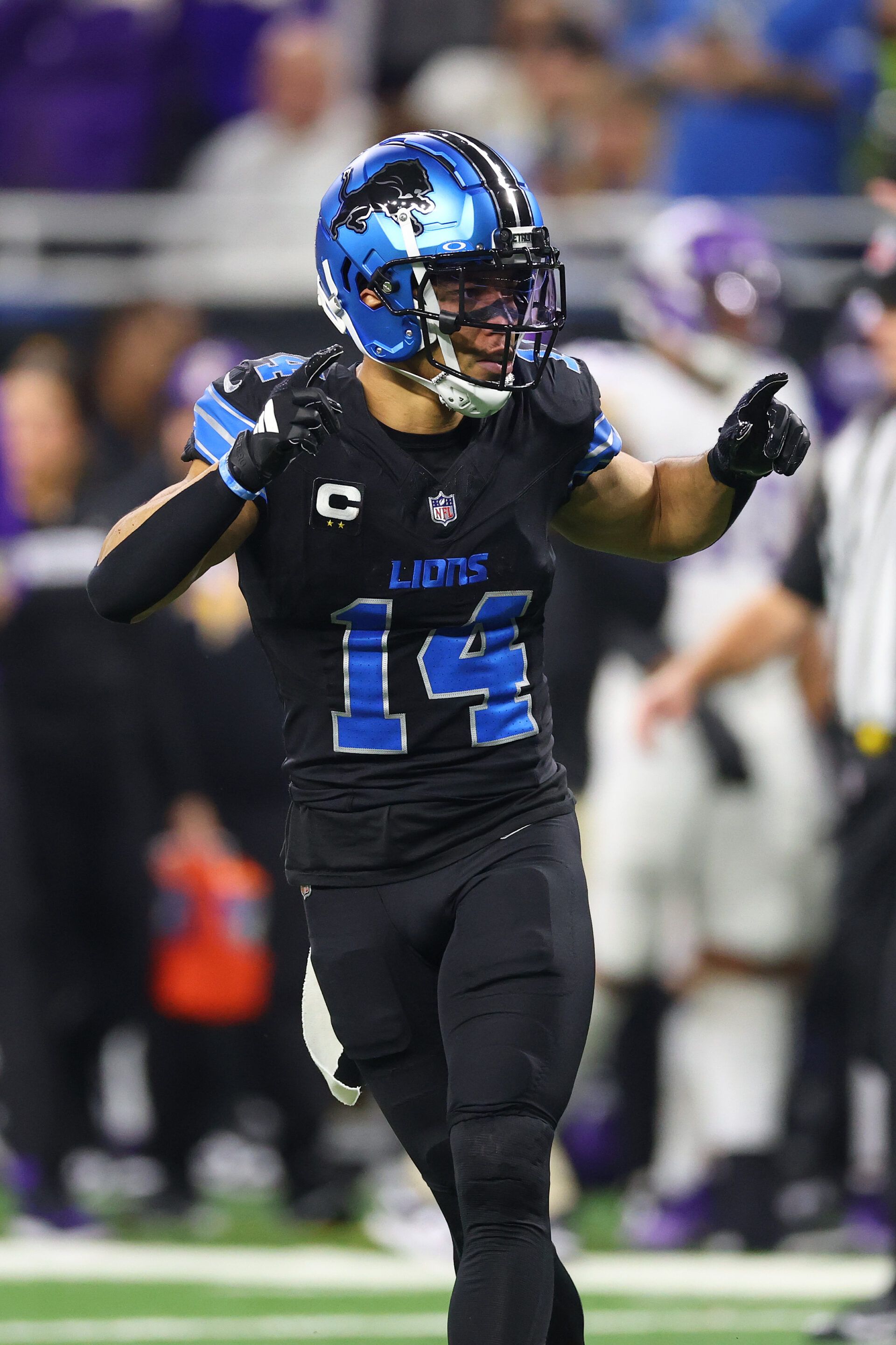 DETROIT, MICHIGAN - JANUARY 05: Amon-Ra St. Brown #14 of the Detroit Lions plays against the Minnesota Vikings at Ford Field on January 05, 2025 in Detroit, Michigan. (Photo by Gregory Shamus/Getty Images)