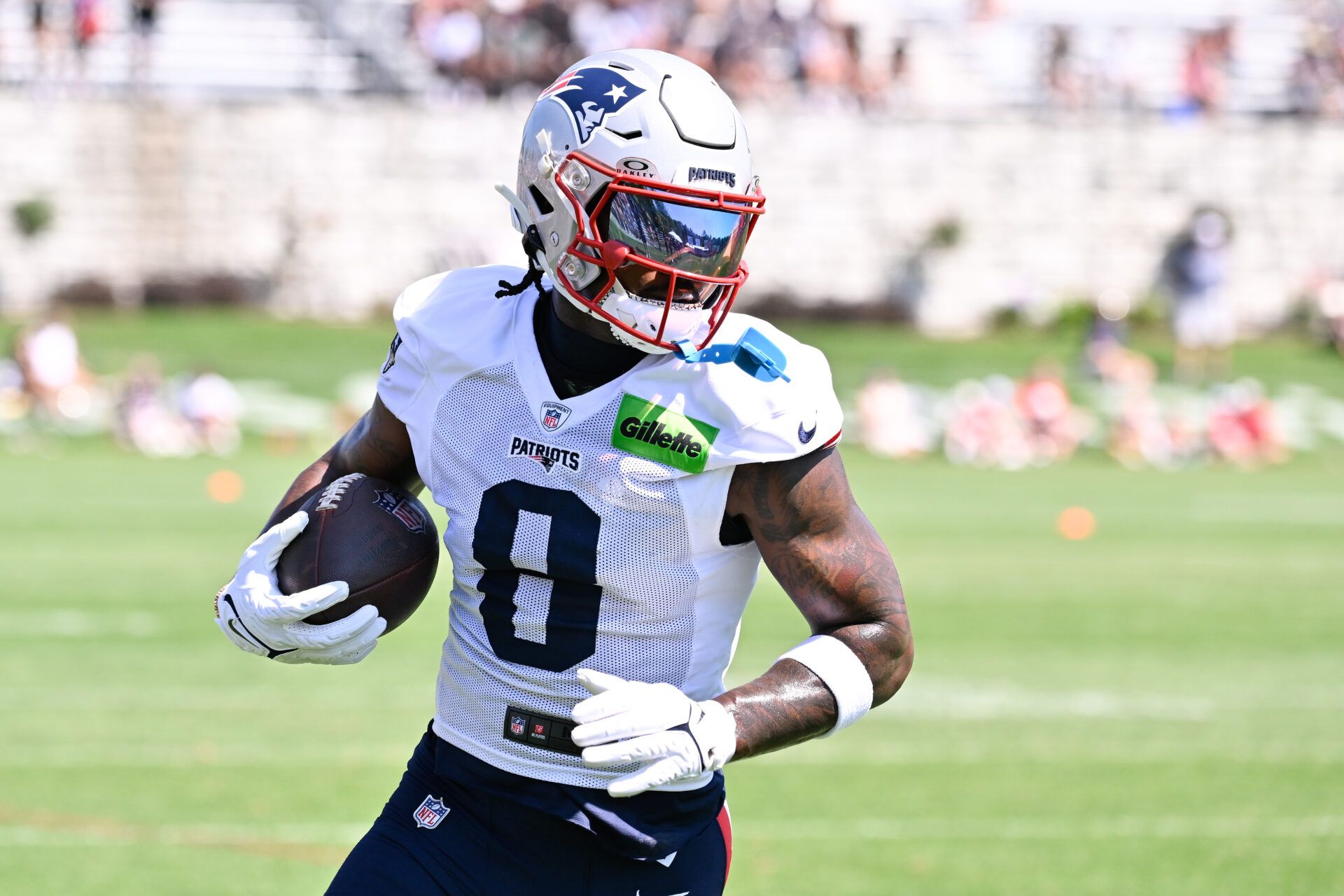 New England Patriots wide receiver Stefon Diggs (8) runs after the catch during training camp at Gillette Stadium.