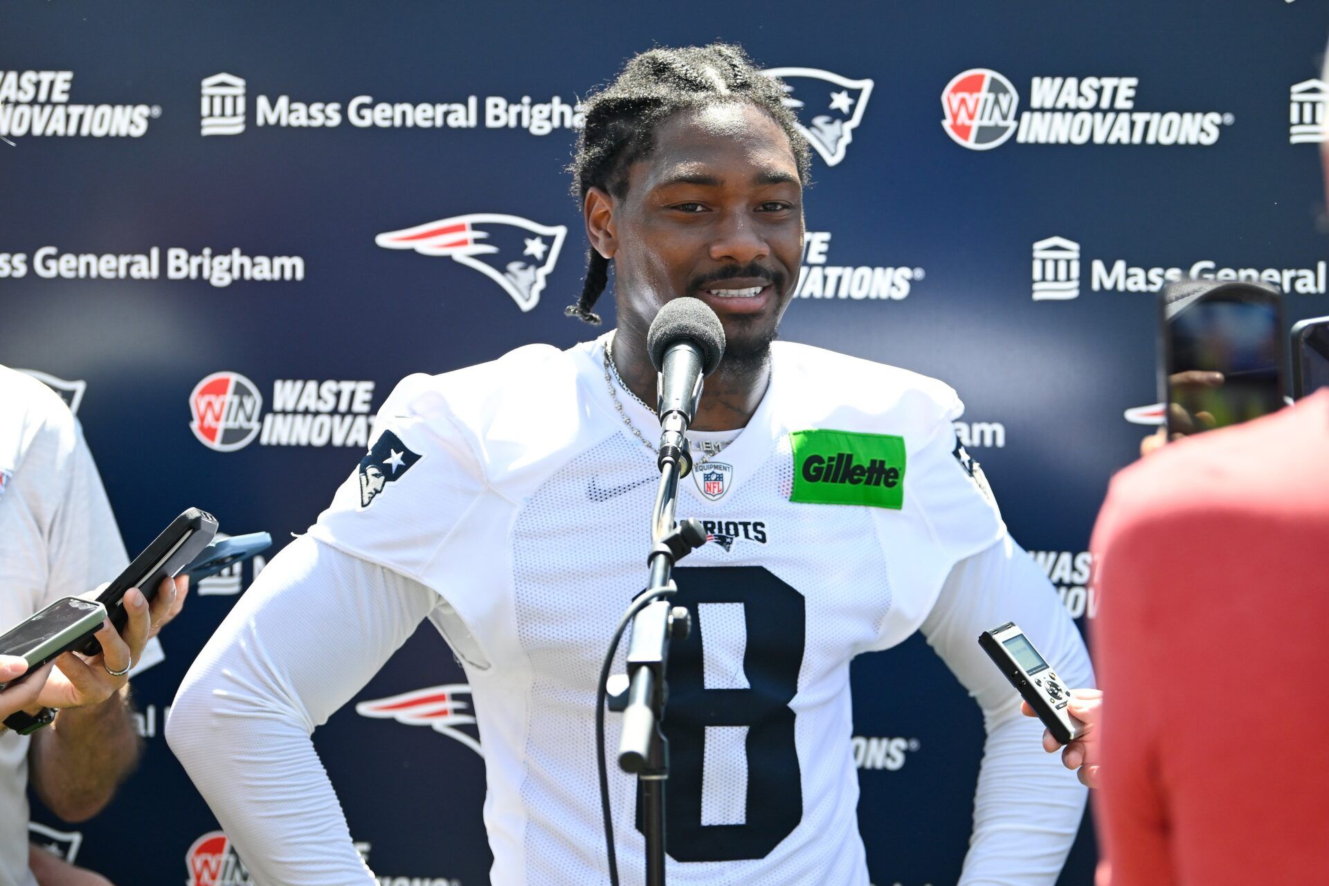 New England Patriots wide receiver Stefon Diggs (8) addresses the media after practice during day one of training camp at Gillette Stadium.