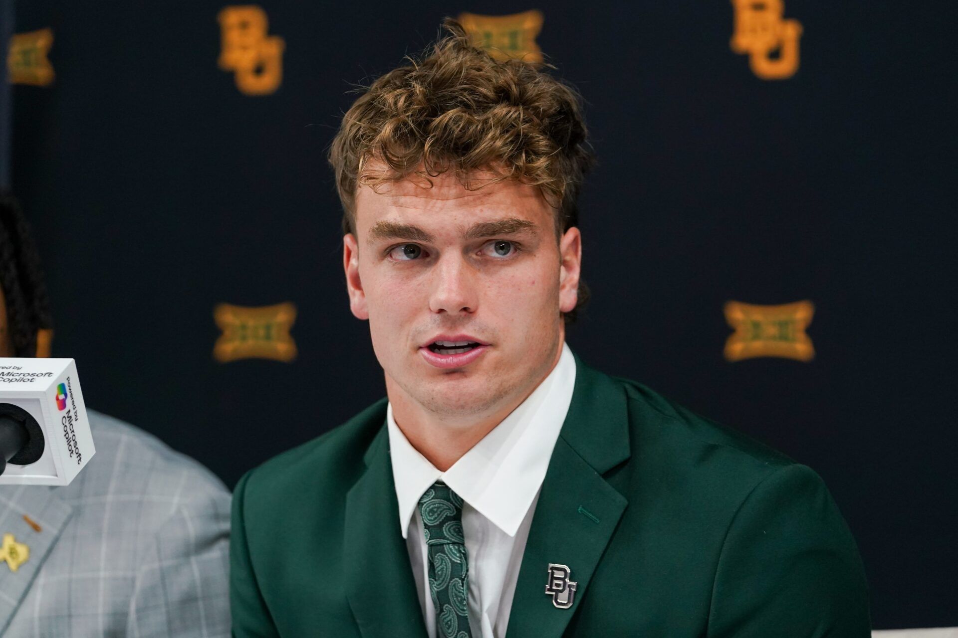 Baylor quarterback Sawyer Robertson answers questions from the media during 2025 Big 12 Football Media Days at The Star.