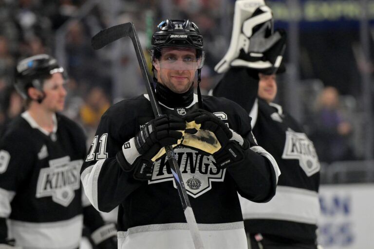 Los Angeles Kings center Anze Kopitar (11) makes a heart with his gloves for he daughter after defeating the Edmonton Oilers in game 2 of the 2025 Stanley Cup Playoffs at Crypto.com Arena.