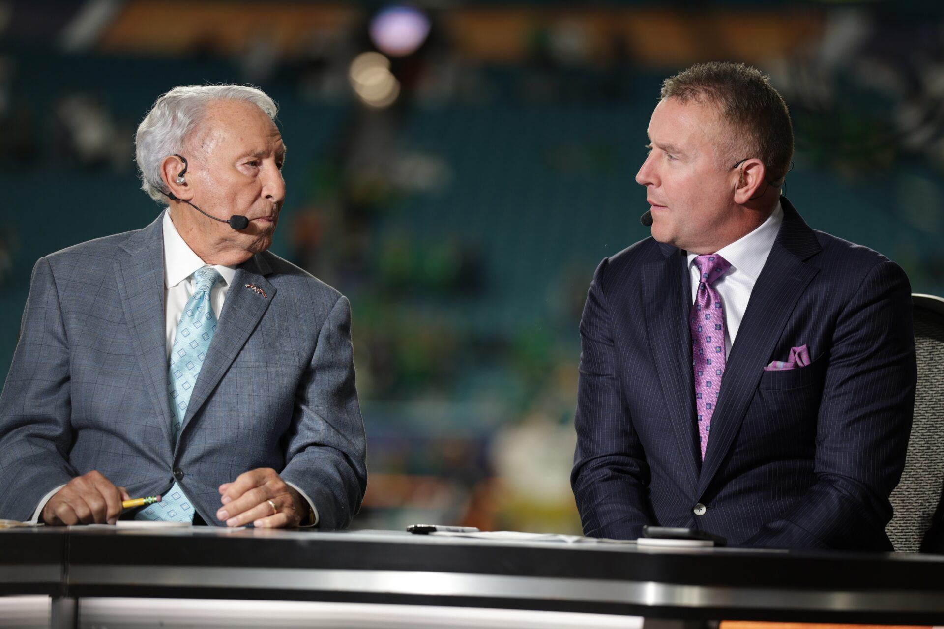 ESPN analysts Lee Corso and Kirk Herbstreit before the game between the Notre Dame Fighting Irish and the Penn State Nittany Lions in the Orange Bowl at Hard Rock Stadium.