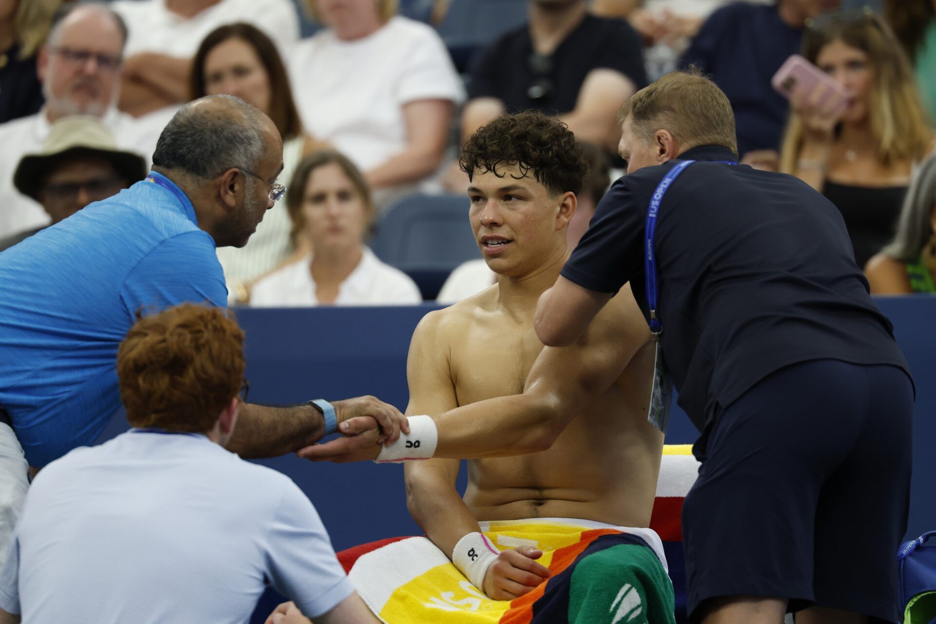 Ben Shelton (USA) (M) is examined by an ATP trainer during a medical timeout against Adrian Mannarino (FRA) (not pictured) on day six of the 2025 US Open tennis tournament at Billie Jean King USTA National Tennis Center.