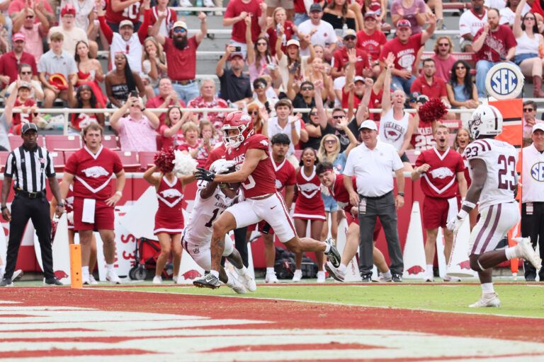 Arkansas Razorbacks wide receiver CJ Brown (3) scores a touchdown against the Alabama A&M Bulldogs during the third quarter at Donald W. Reynolds Razorback Stadium.
