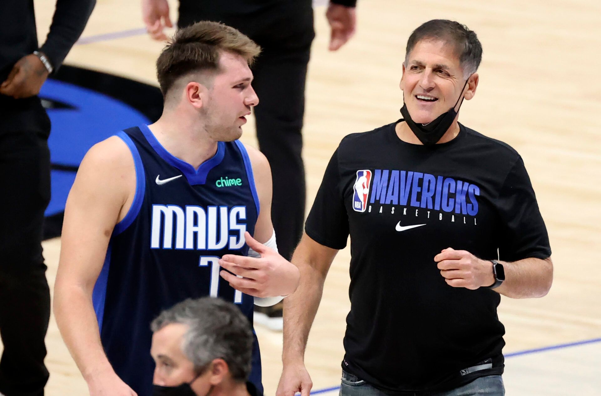 Dallas Mavericks guard Luka Doncic (77) laughs with owner Mark Cuban after the game against the Detroit Pistons at American Airlines Center.