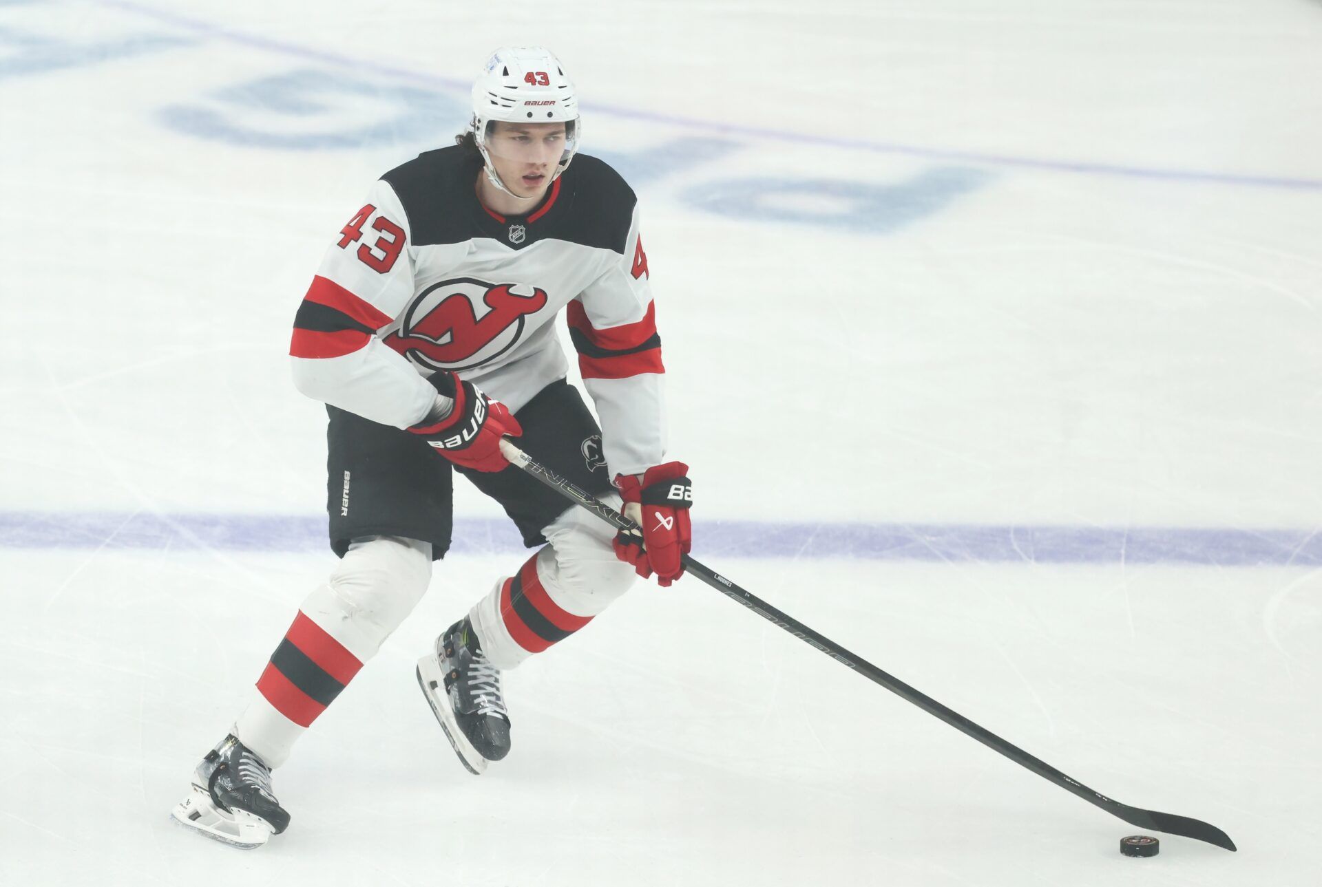 New Jersey Devils defenseman Luke Hughes (43) warms up against the Pittsburgh Penguins at PPG Paints Arena.