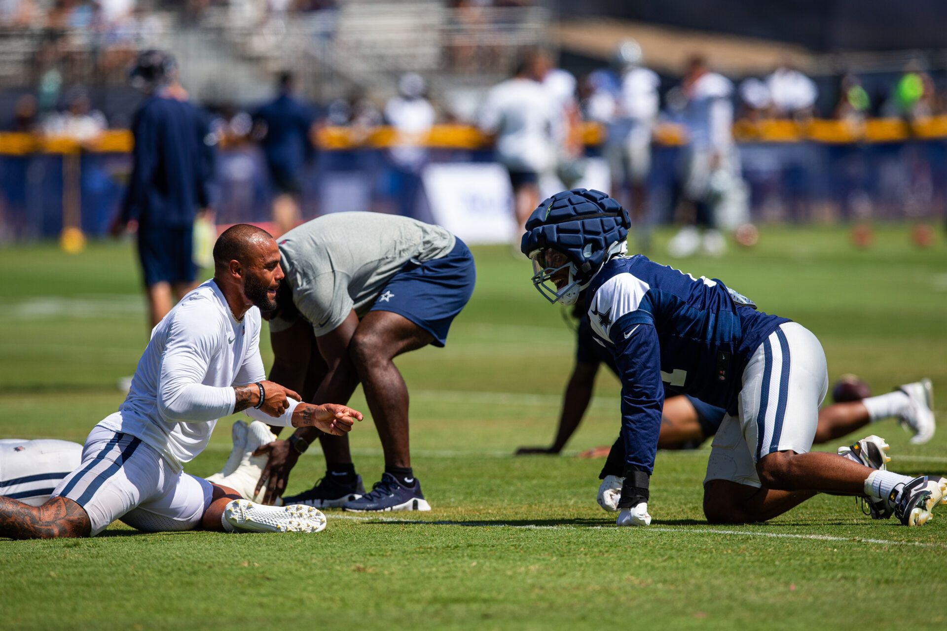 Dallas Cowboys quarterback Dak Prescott (4) and linebacker Micah Parsons (11) during training camp at Marriott Residence Inn-River Ridge playing fields.