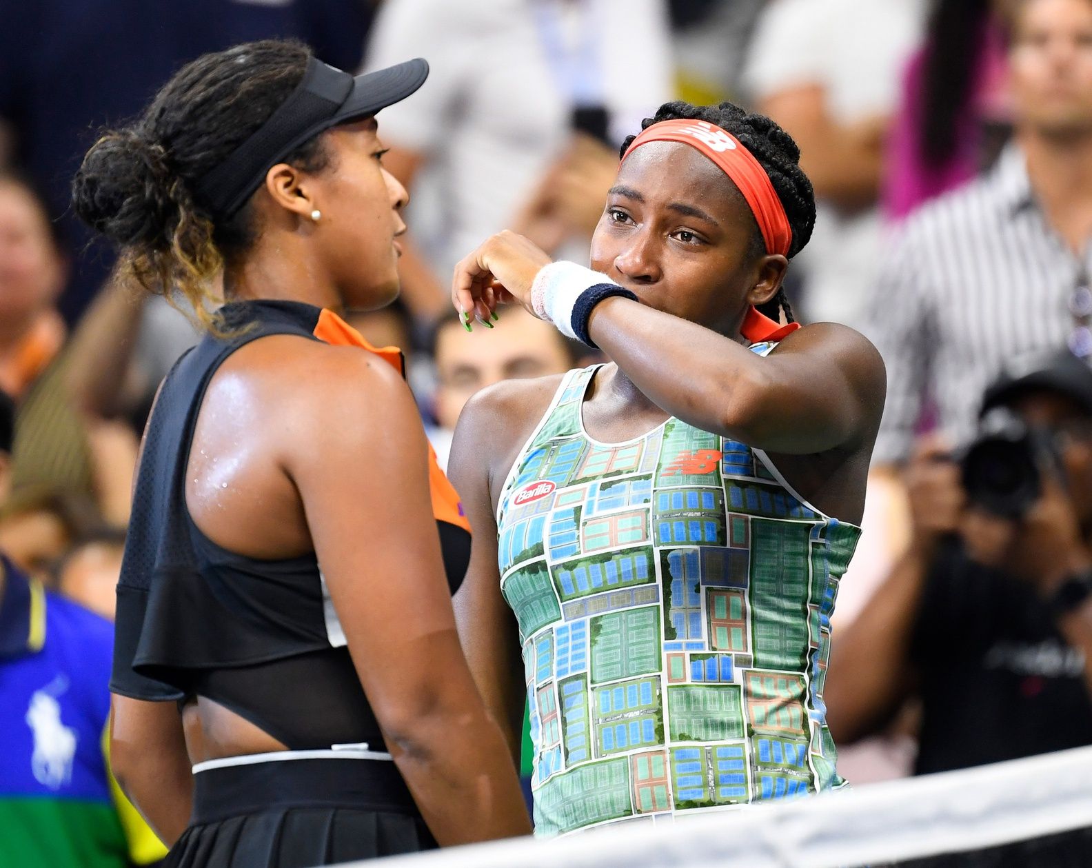Naomi Osaka of Japan (left) consoles Coco Gauff of the USA after their third round match on day six of the 2019 U.S. Open tennis tournament at USTA Billie Jean King National Tennis Center.