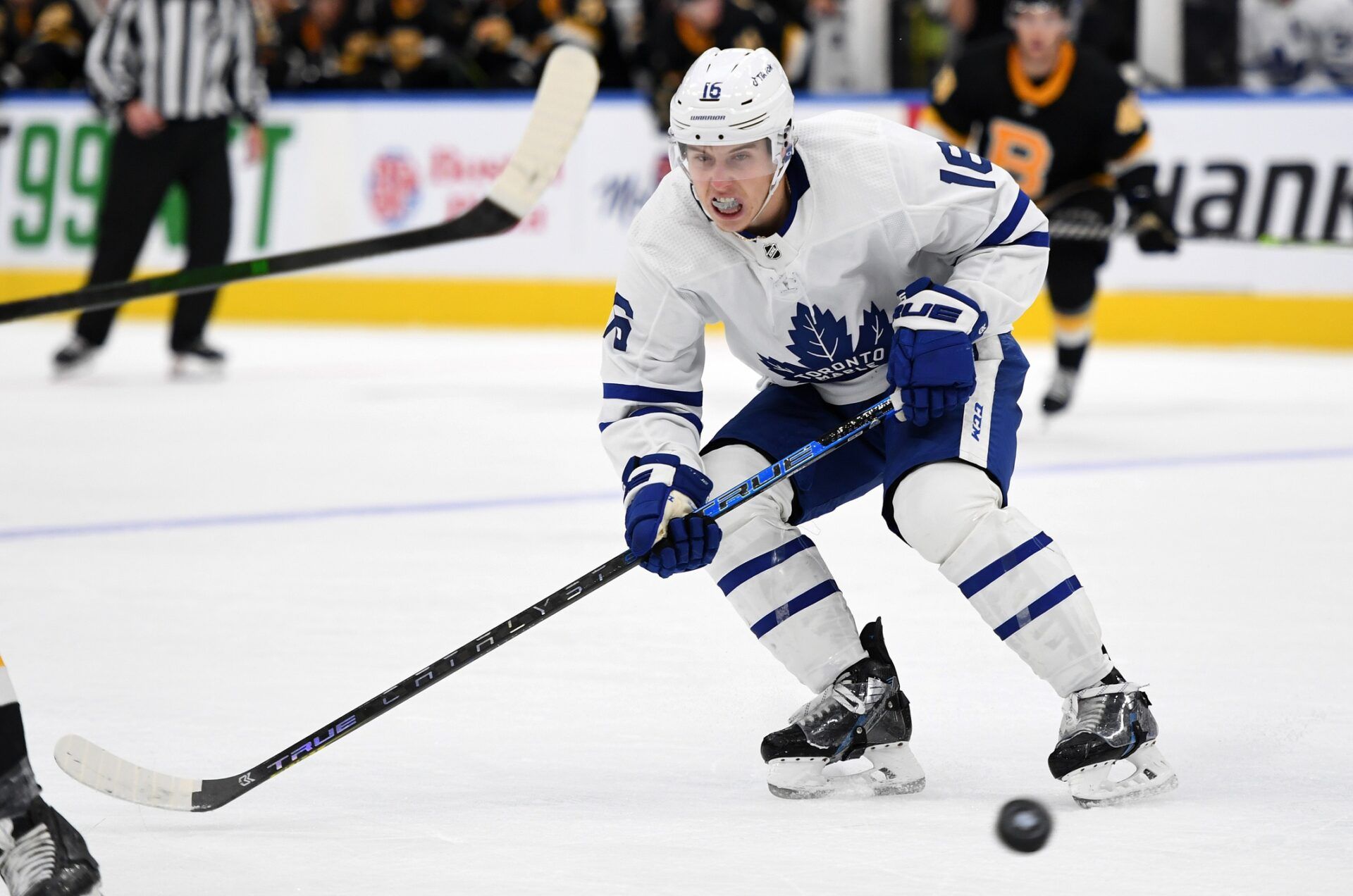 Toronto Maple Leafs forward Mitch Marner (16) chases a loose puck in the third period against Boston Bruins at Scotiabank Arena.