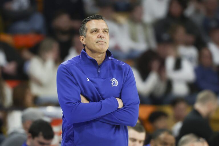 San Jose State Spartans head coach Tim Miles looks on from the bench during the first half of the game against the Utah State Aggies at Dee Glen Smith Spectrum.