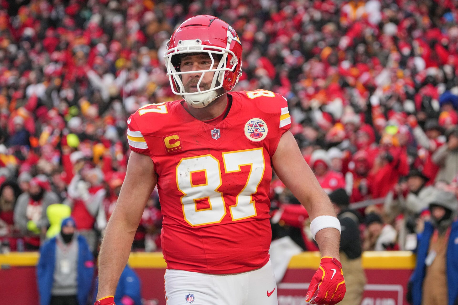 Kansas City Chiefs tight end Travis Kelce (87) celebrates after a run against the Houston Texans during the first half of a 2025 AFC divisional round game at GEHA Field at Arrowhead Stadium.