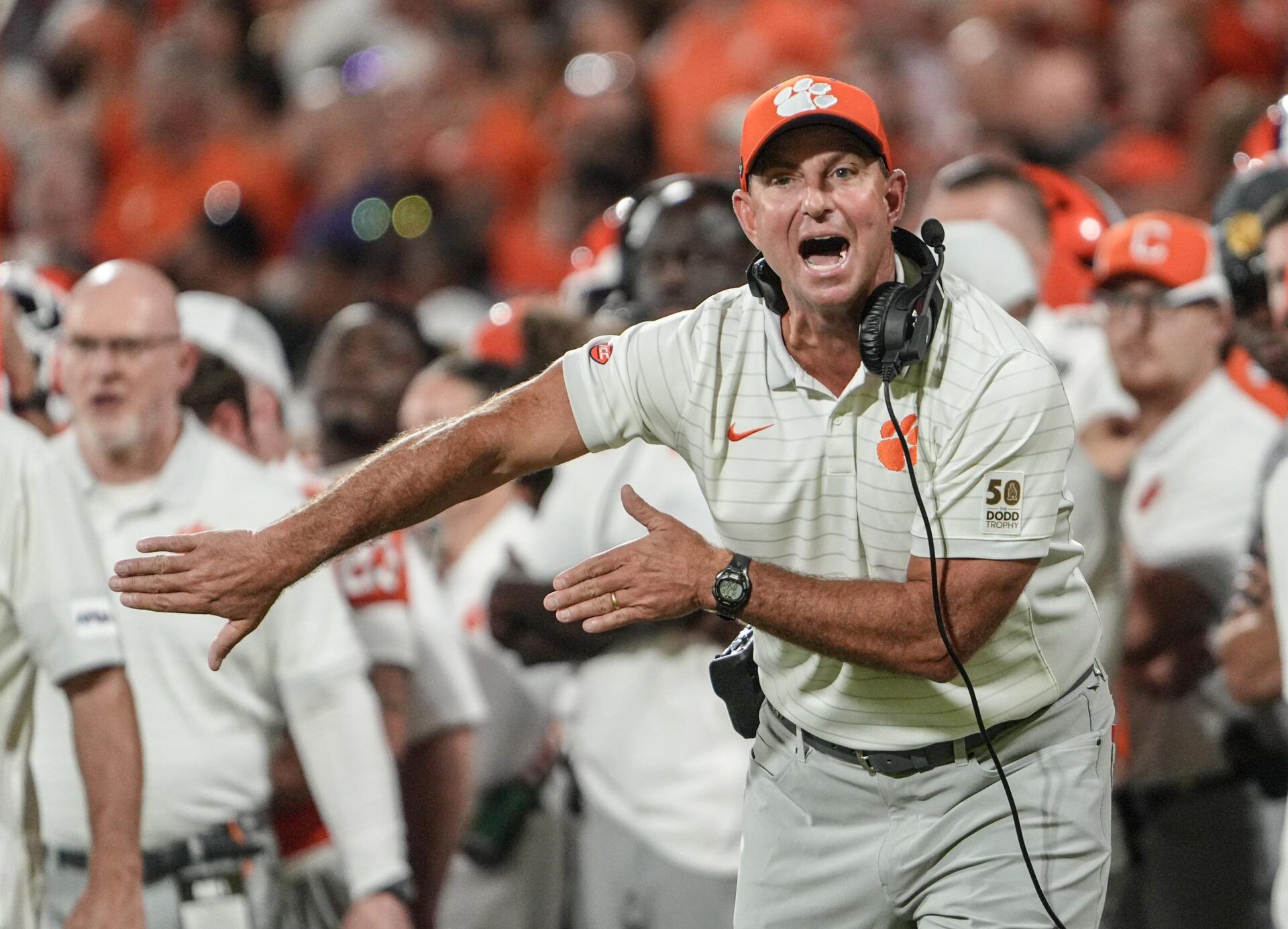 Clemson head coach Dabo Swinney communicates with a referee in the game with Louisiana State University during the second quarter at Memorial Stadium in Clemson, S.C. Saturday, Aug 30, 2025.
