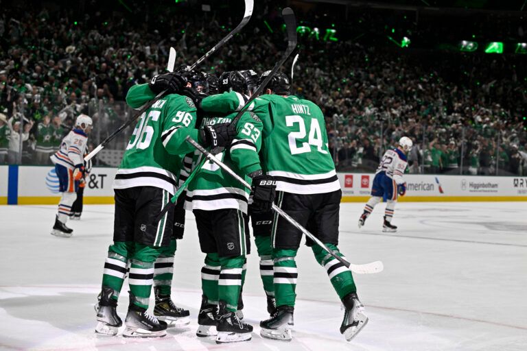 Dallas Stars left wing Jason Robertson (21) reacts with center Wyatt Johnston (53) after scoring a goal against the Edmonton Oilers during the second period in game five of the Western Conference Final of the 2025 Stanley Cup Playoffs at American Airlines Center.