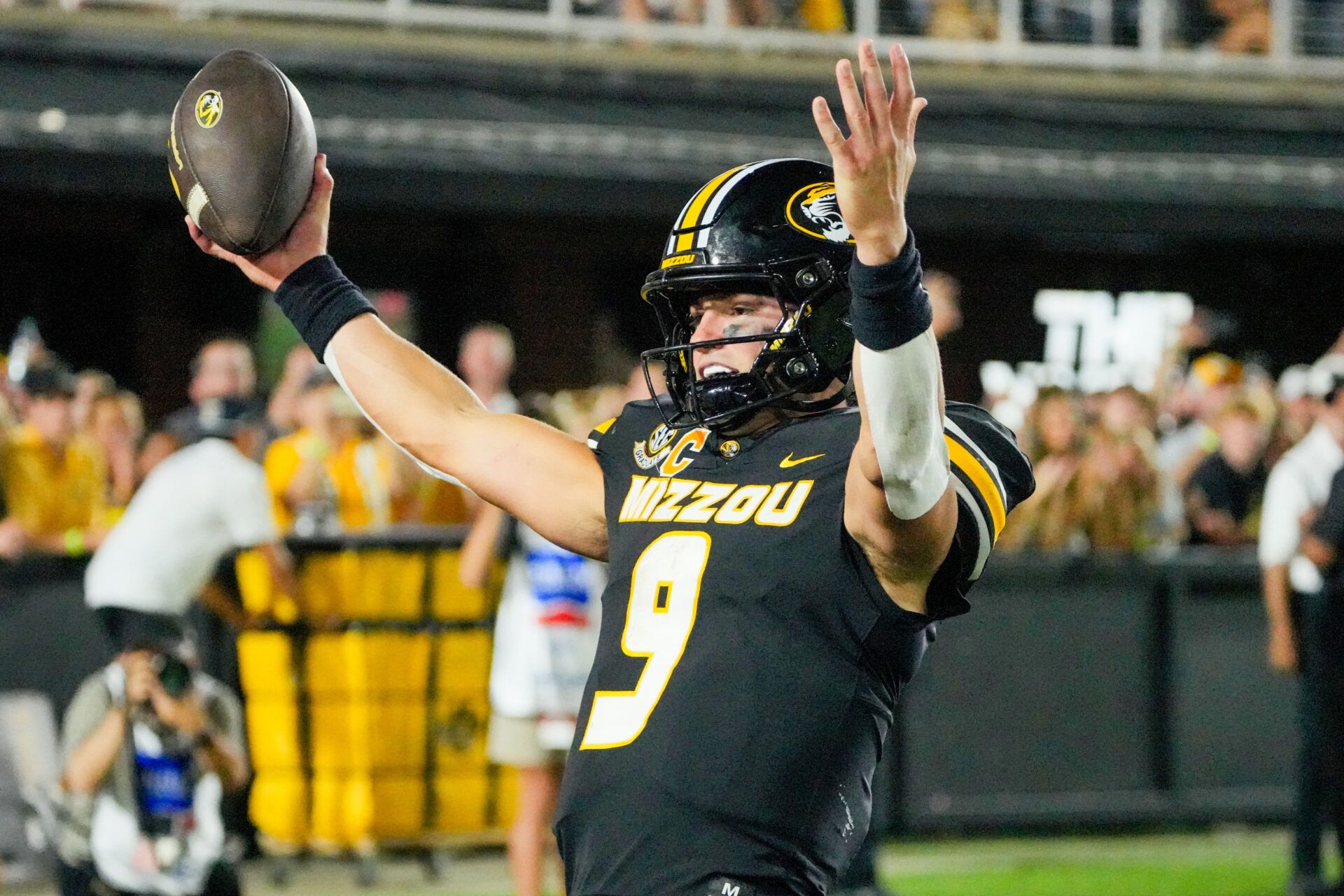 Missouri Tigers quarterback Beau Pribula (9) celebrates after scoring a touchdown against the Central Arkansas Bears during the second half of the game at Faurot Field at Memorial Stadium.